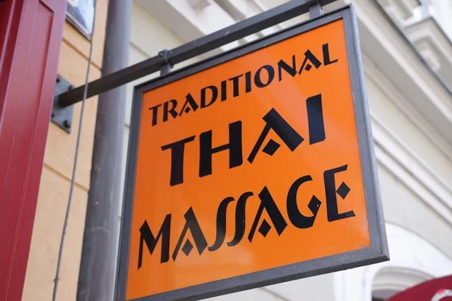 "Traditional Thai Massage" sign.