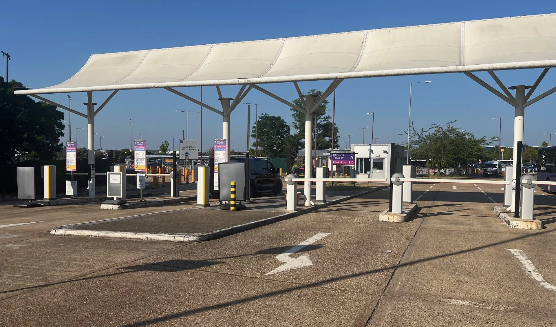 The in and out gates at the entrance to Heathrow Terminal 4 car park