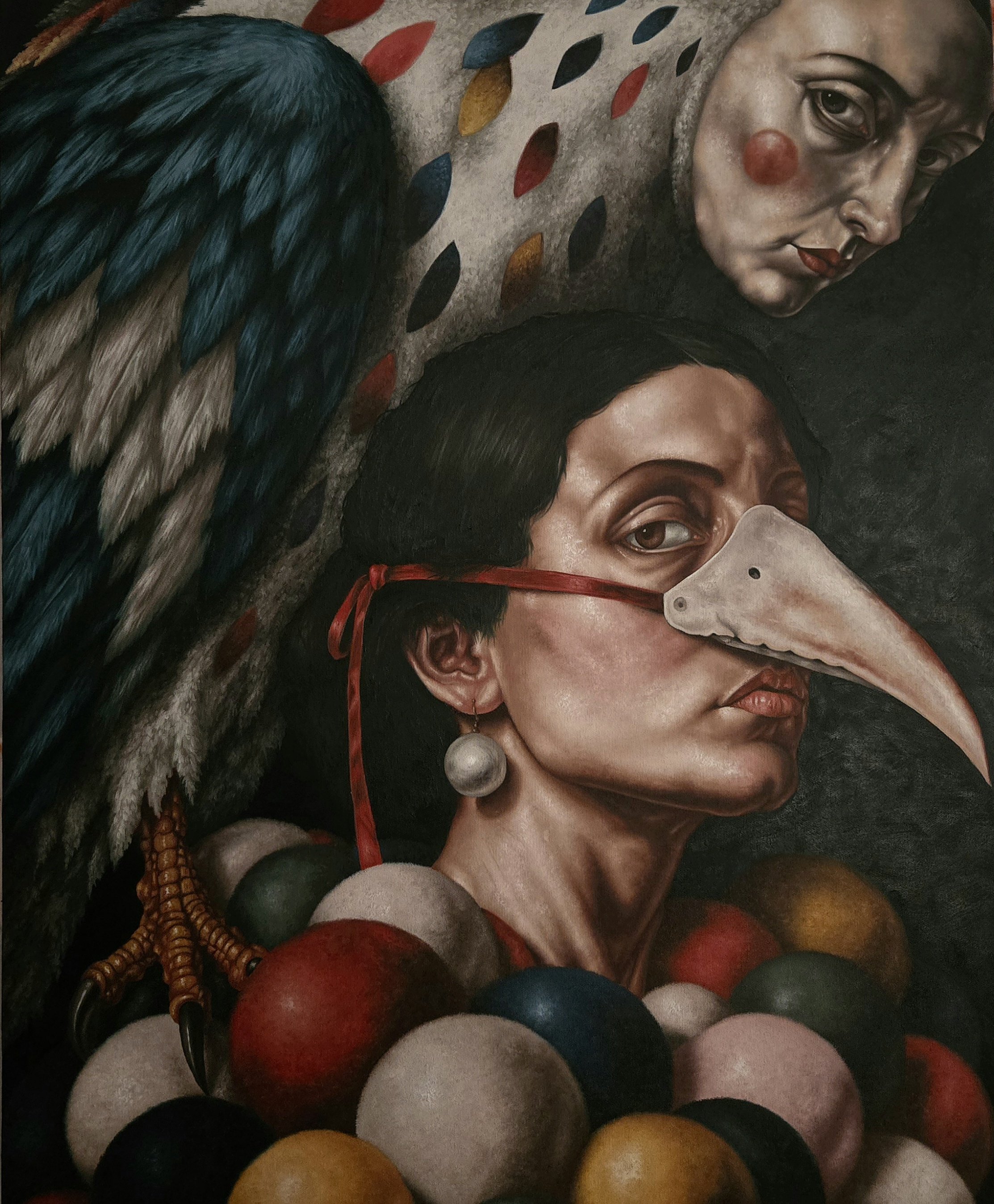 A painting of a person holding a long fork with their left hand, with their torso covered in colorful balloons or circular shapes against a green background.