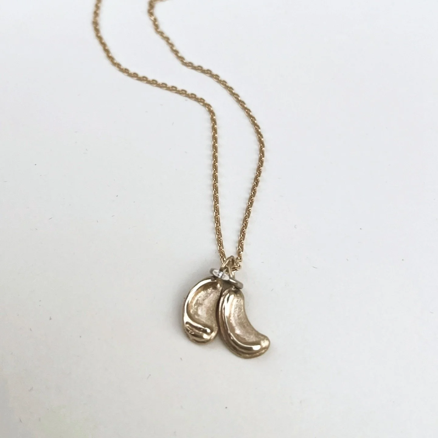 This one is particularly cute because of its meaning. This is an engagement ring &hearts;️ 
It&rsquo;s the life line from each of their kids made as small organic pendants and the smallest diamond ring I&rsquo;ve ever created. The ring surrounds the 