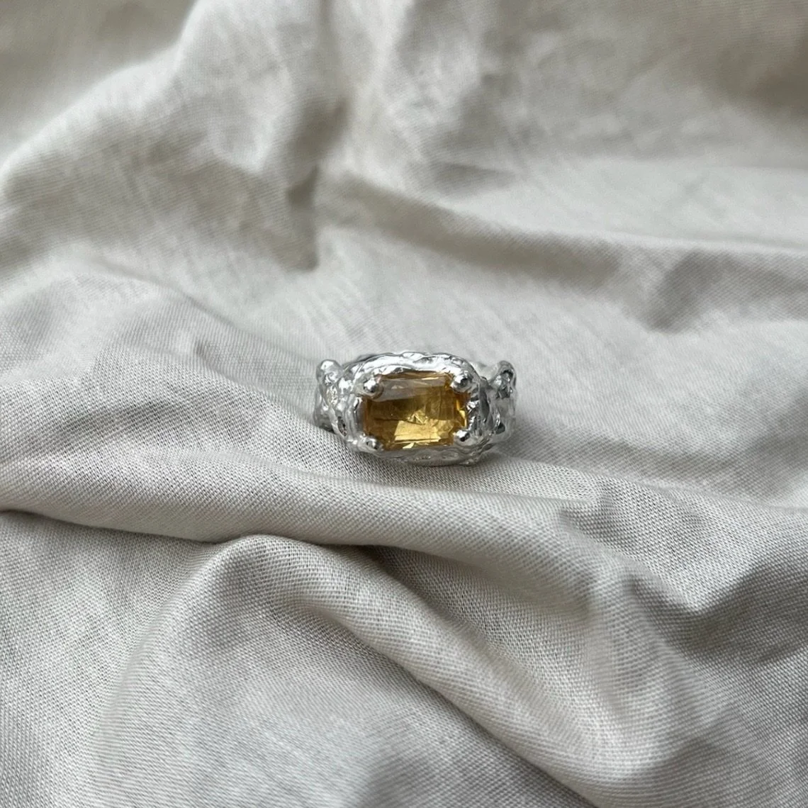 This one of a kind silver ring was created in collaboration with the sweetest couple 🤍
A citrine in the center, diamonds catching the light and hidden inside the ring is the partner&rsquo;s fingerprint.
The two small stones on the side represent the