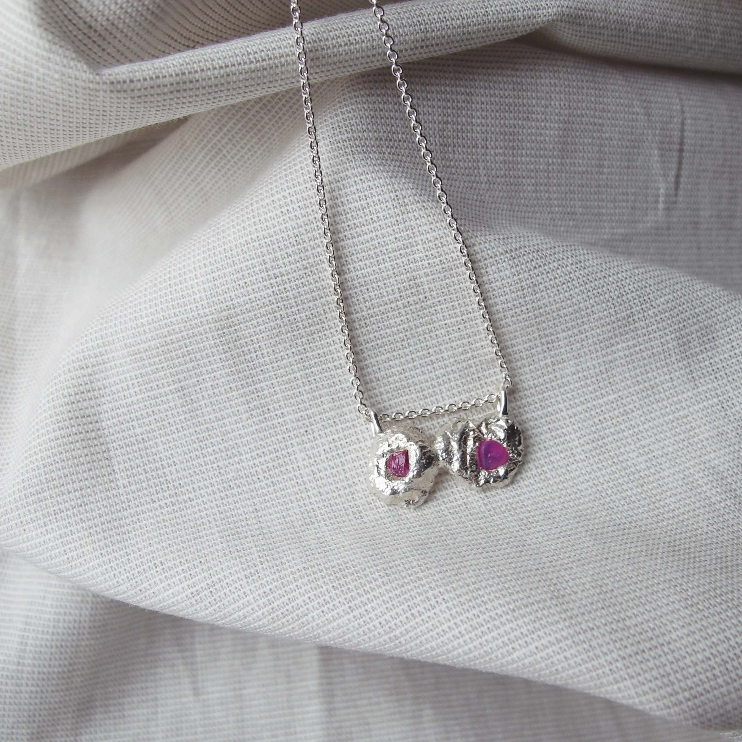 One of a kind necklace in silver with pinkish sapphires. 
A delicate yet sculptural piece - soft, organic and open to interpretation. Made to become many things, depending on who wears it ⚒️🖤

#liseskovgaardjewellery