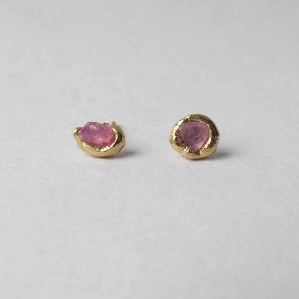 They are made the same way but are never the exact same objects. 
Which one is your favorite pair? 
Earrings with sapphires and rubies in silver and with 24 kt gold plating ✨

#liseskovgaardjewellery