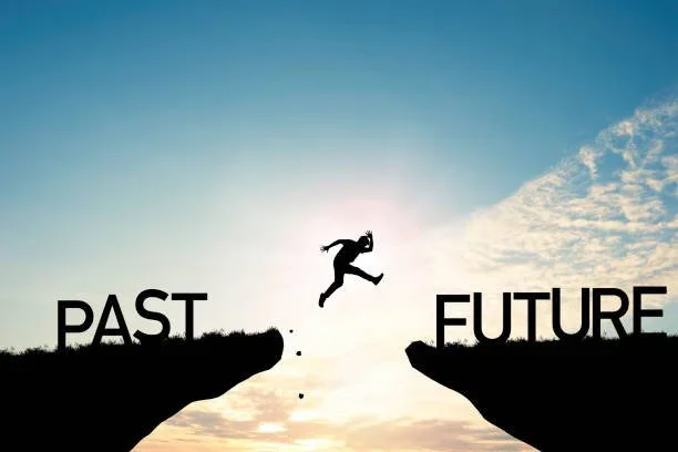 Person jumping from past to future