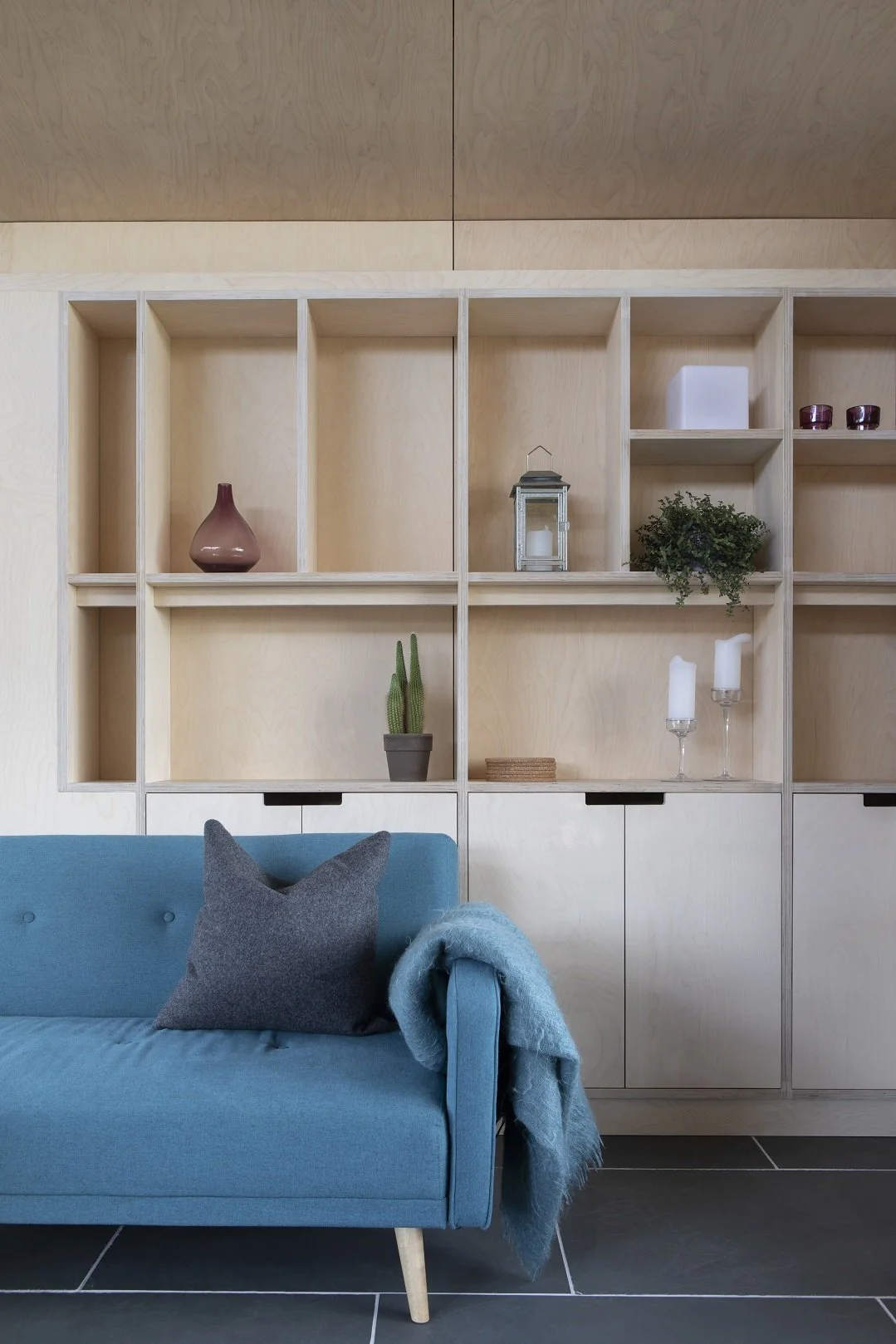 Sofa and plywood shelves