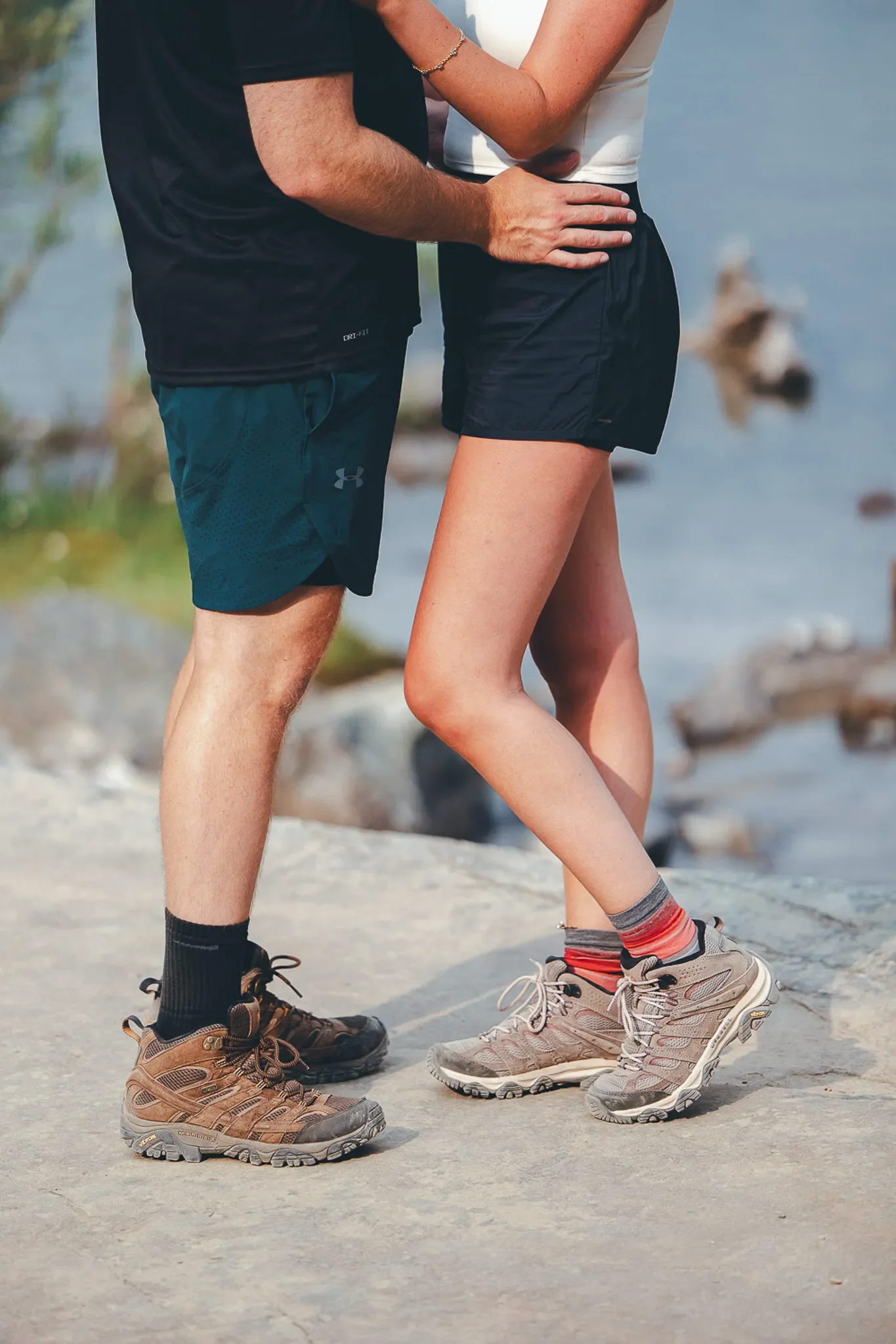 149_couple-hiking-alpine-lake-rocky-mountain-trail.webp