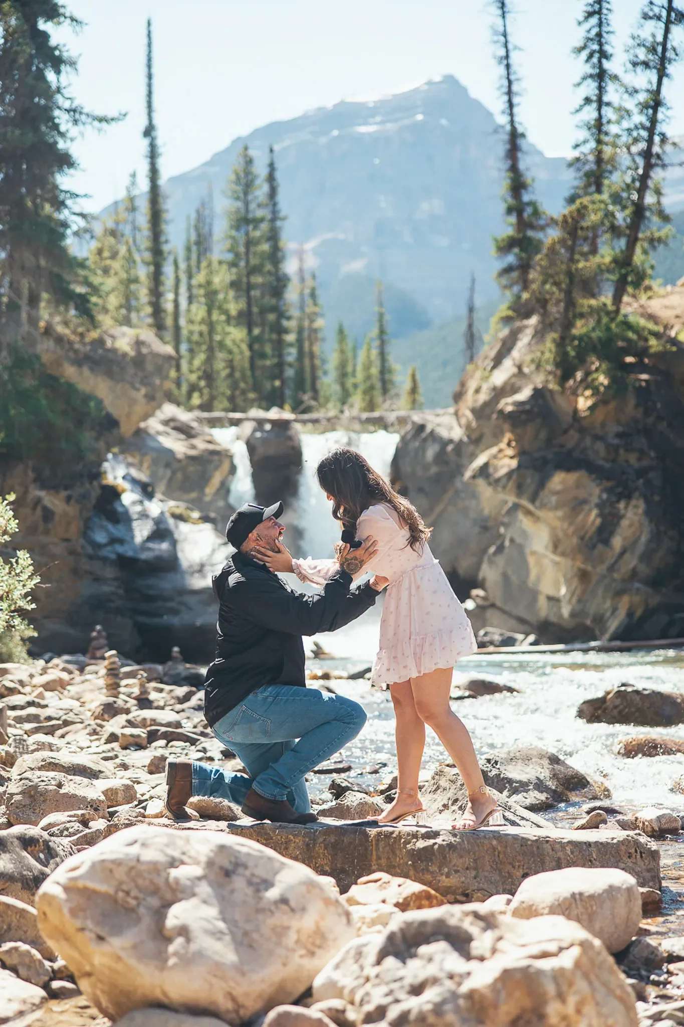 139_Couple-Proposal-Mountain-River-Waterfall-Canadian-Rockies.webp