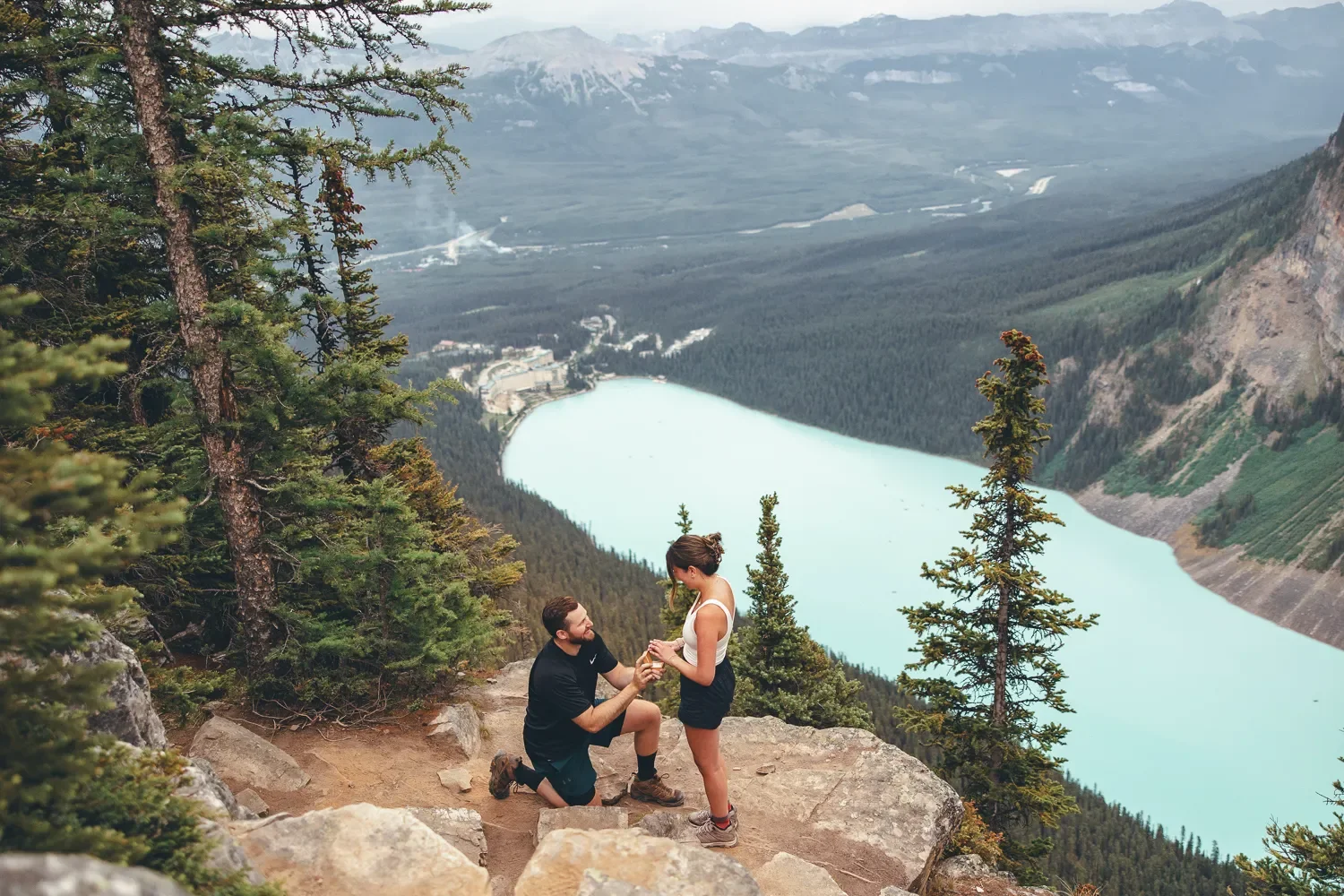 103_Couple-Proposal-Lake-Louise-Banff-Mountain-Viewpoint.webp
