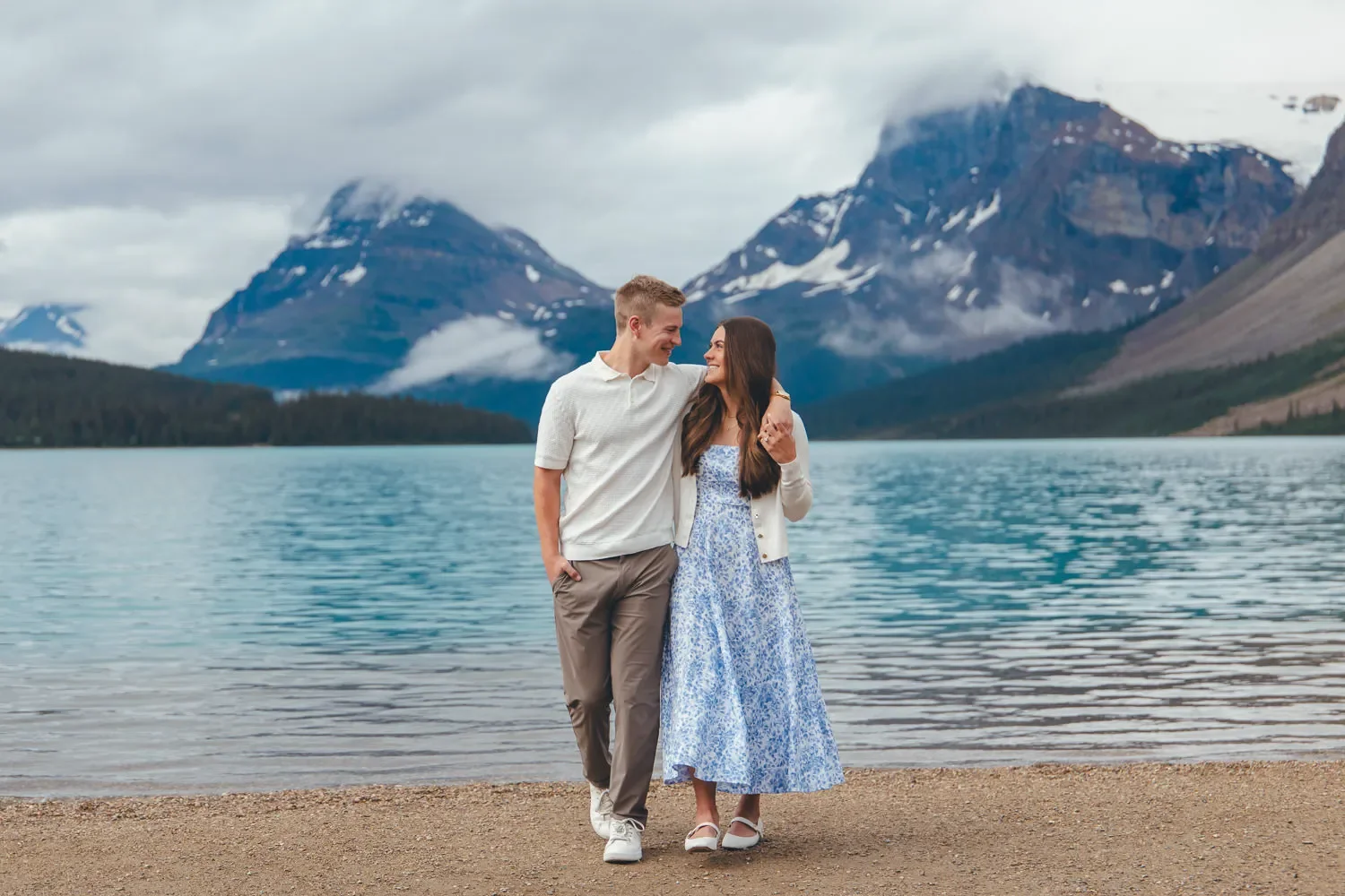 111_Couple-Walking-Banff-National-Park-Alpine-Lake.webp