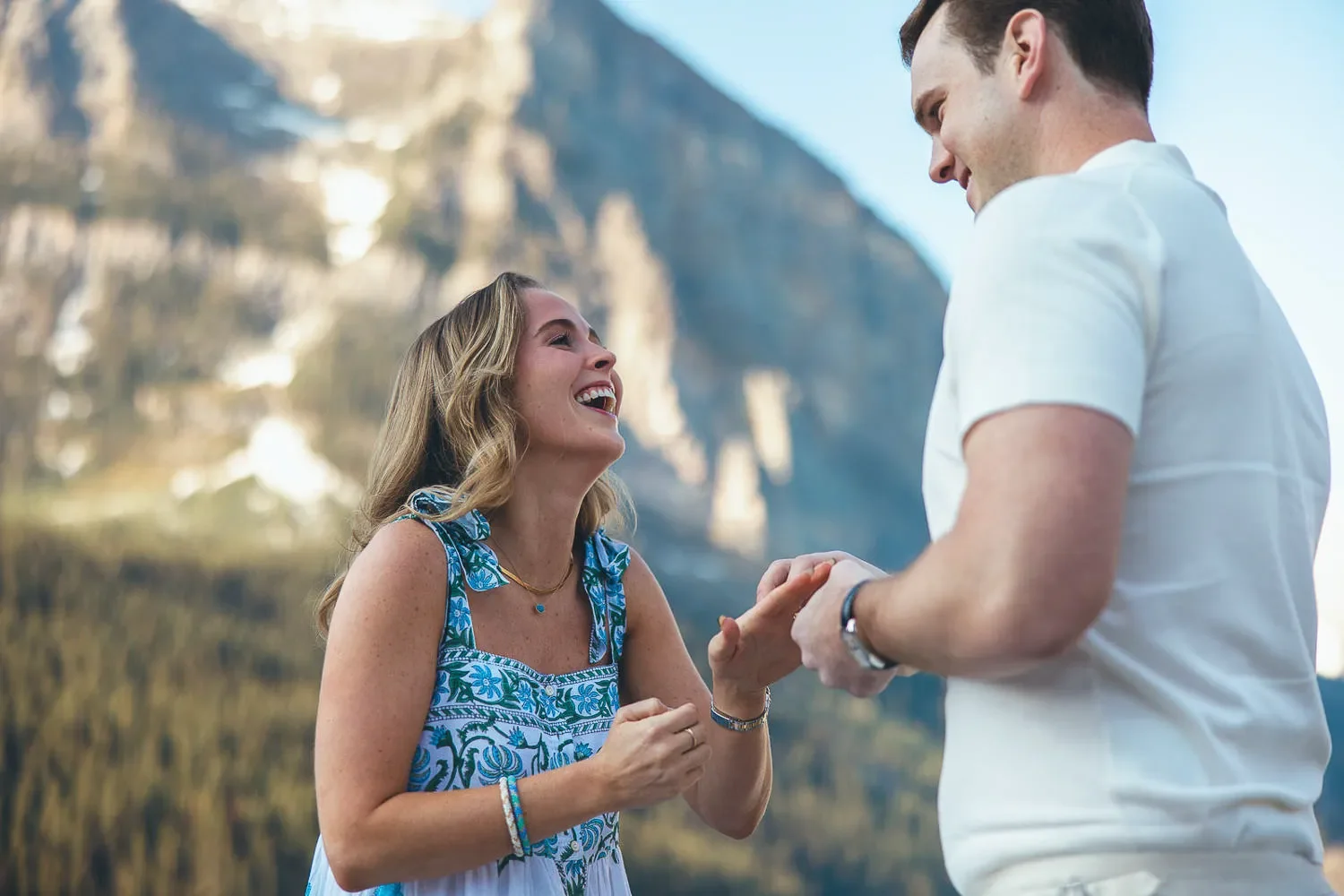 113_Joyful-Couple-Engagement-Proposal-Canadian-Rockies-Mountain-Viewpoint.webp