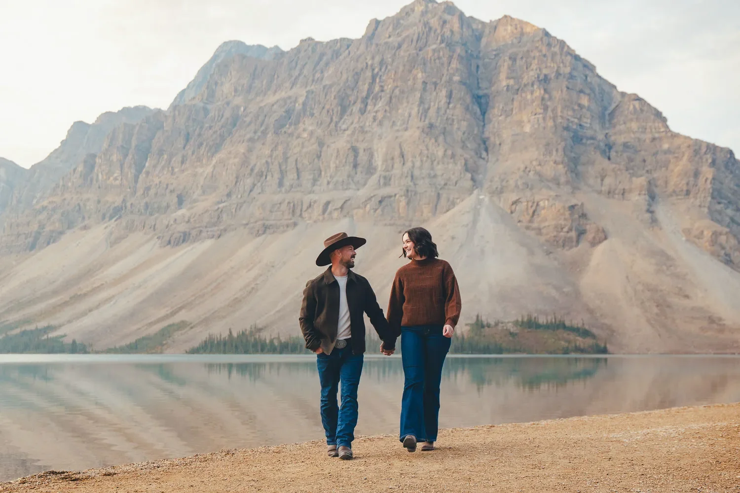 108_Couple-Walking-Alpine-Lake-Canadian-Rockies.webp