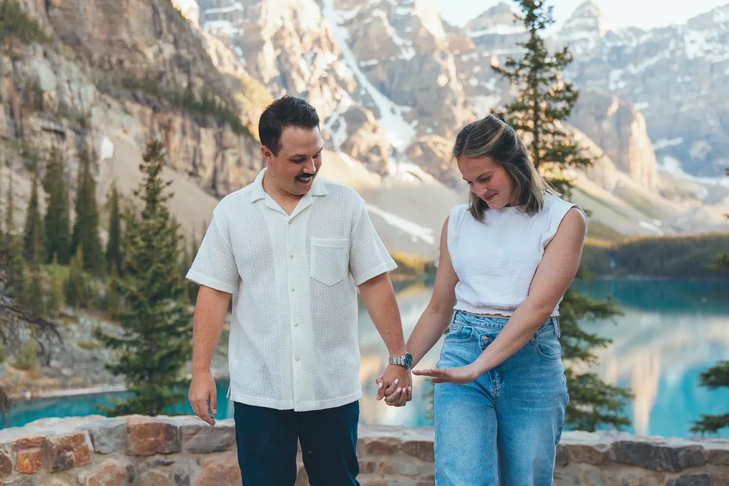 116_couple-engagement-moraine-lake-banff-mountain-landscape.webp