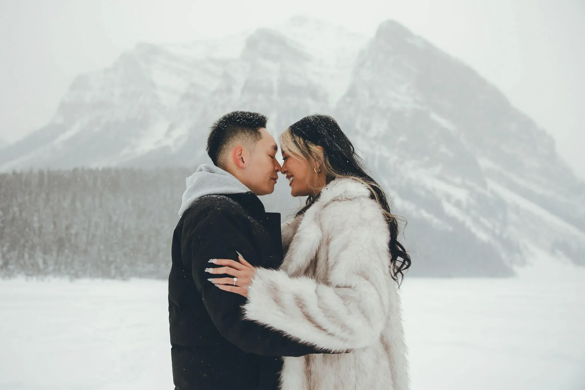 107_Couple-Engagement-Canadian-Rockies-Winter-Mountain-Landscape.webp