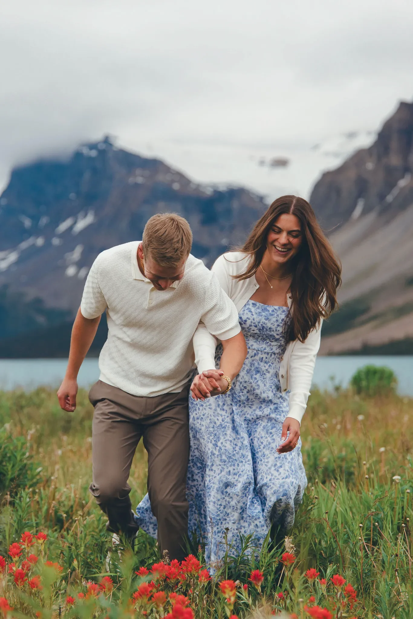 105_Couple-Walking-Wildflower-Meadow-Canadian-Rockies.webp