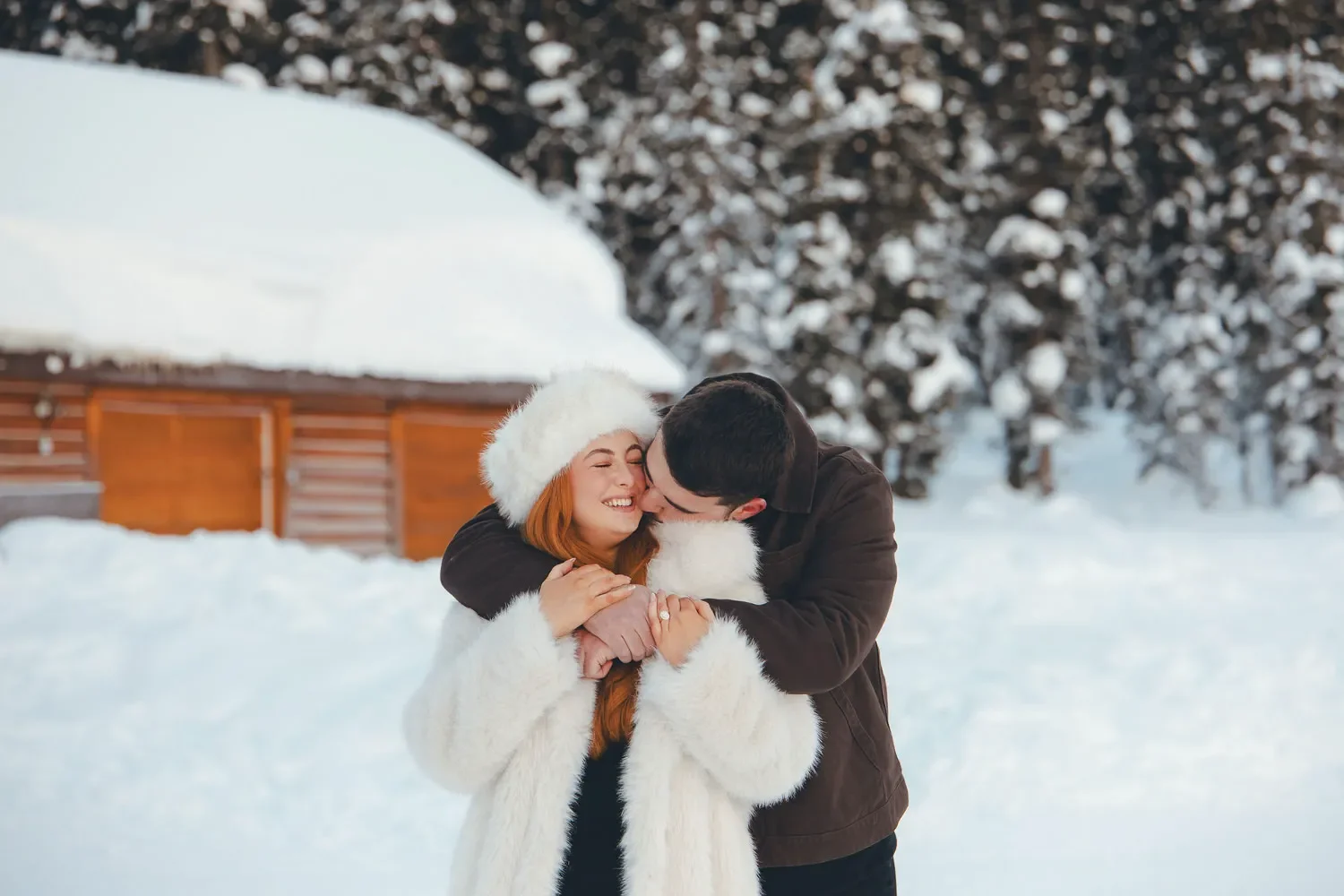 112_Couple-Engagement-Winter-Forest-Snowy-Cabin.webp