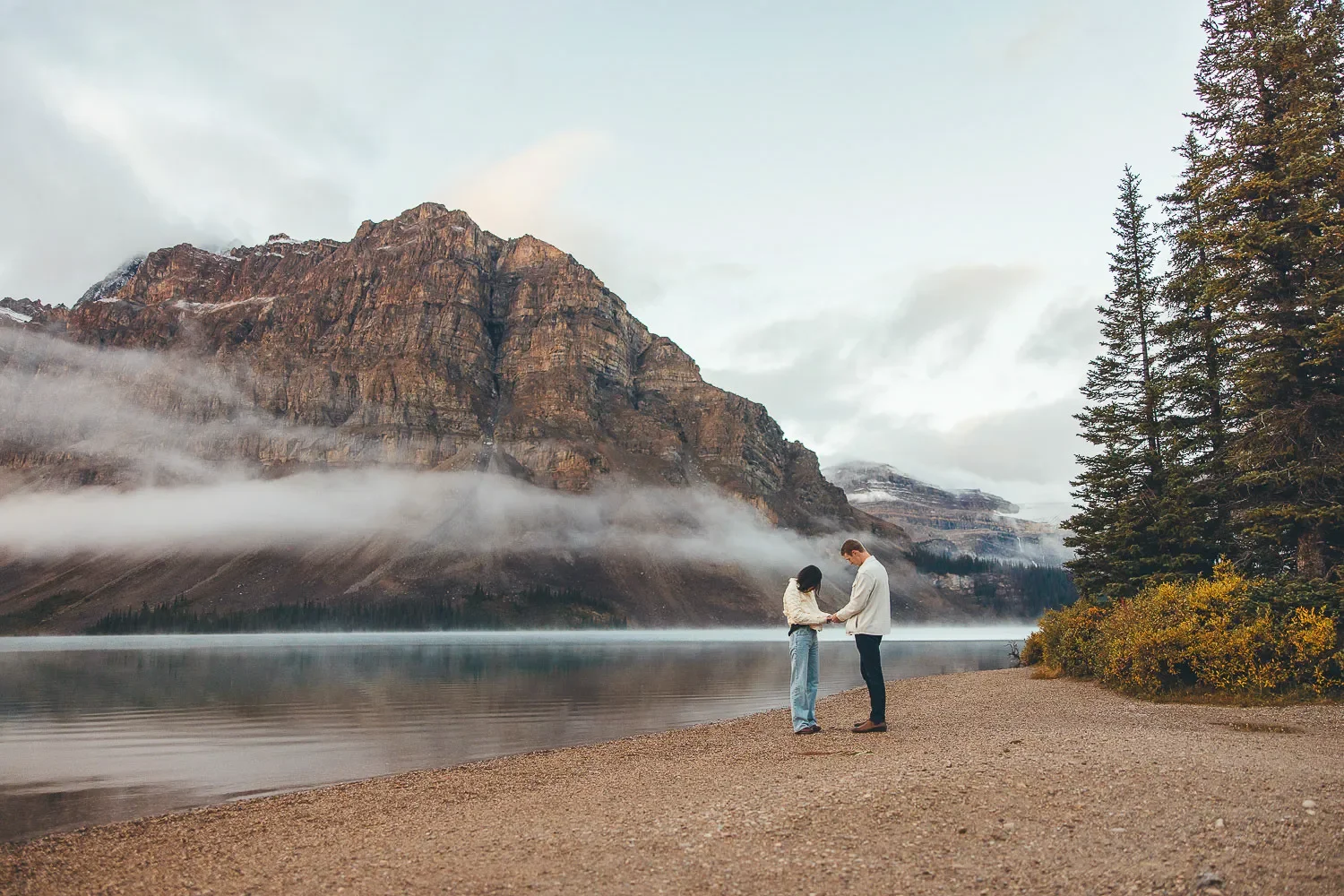 102_Couple-Holding-Hands-Misty-Mountain-Lake-Banff.webp