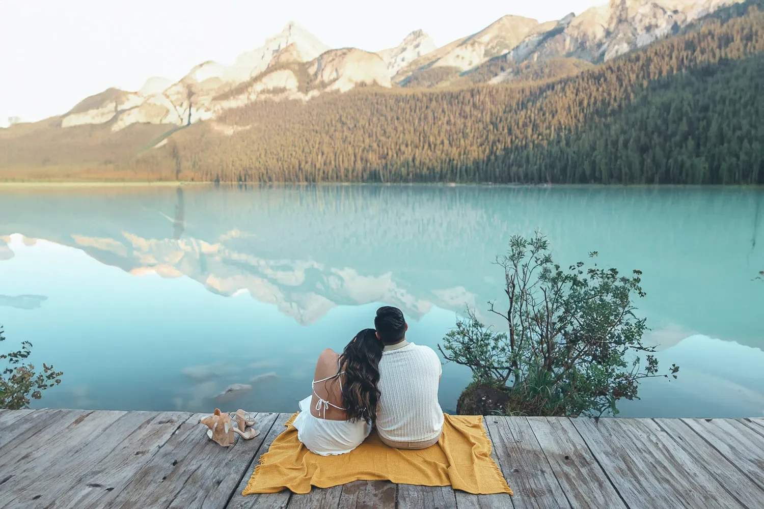 125_Couple-Sitting-Dock-Alpine-Lake-Canadian-Rockies.webp