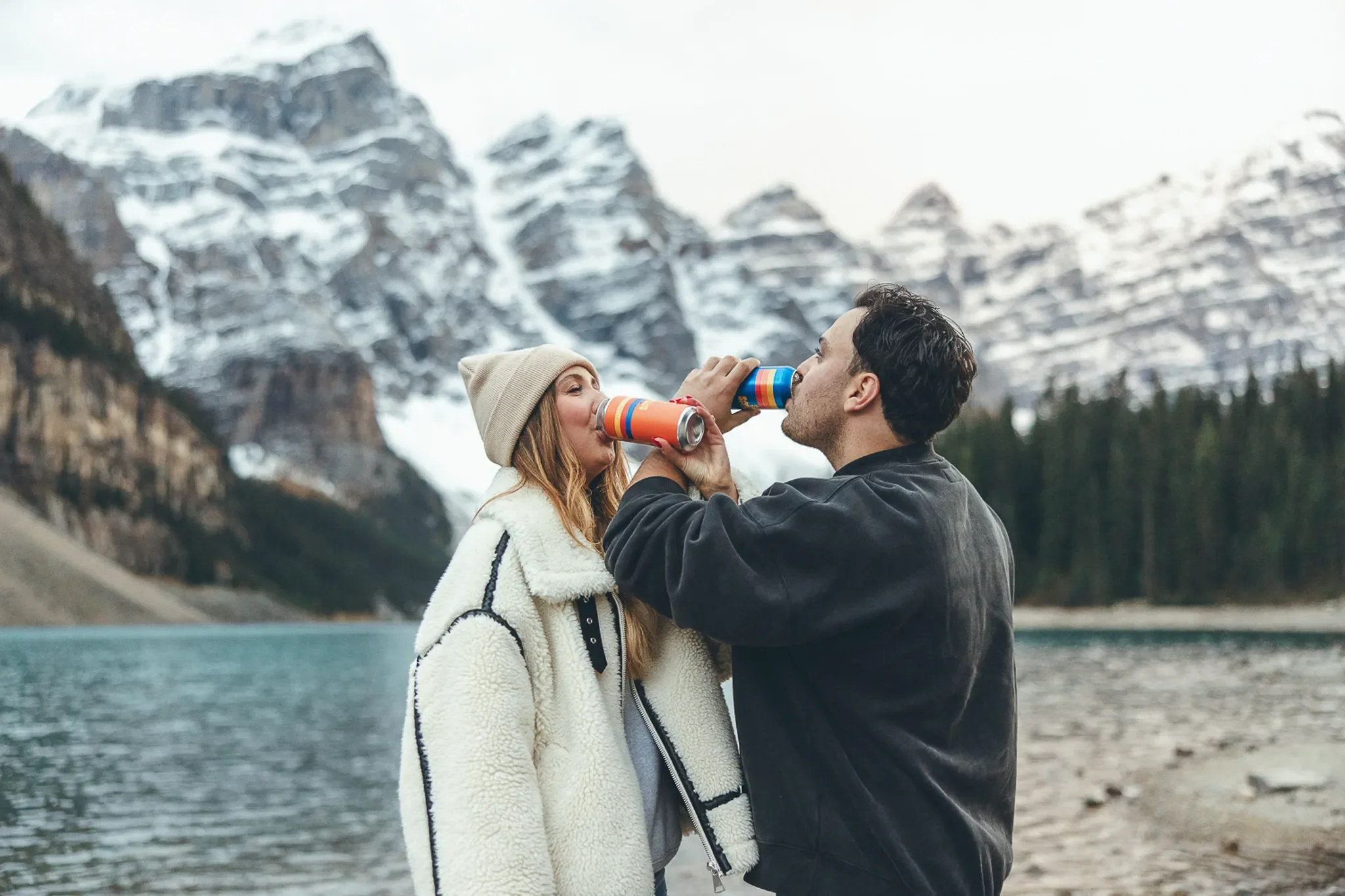 157_Couple-Drinking-Moraine-Lake-Banff.webp