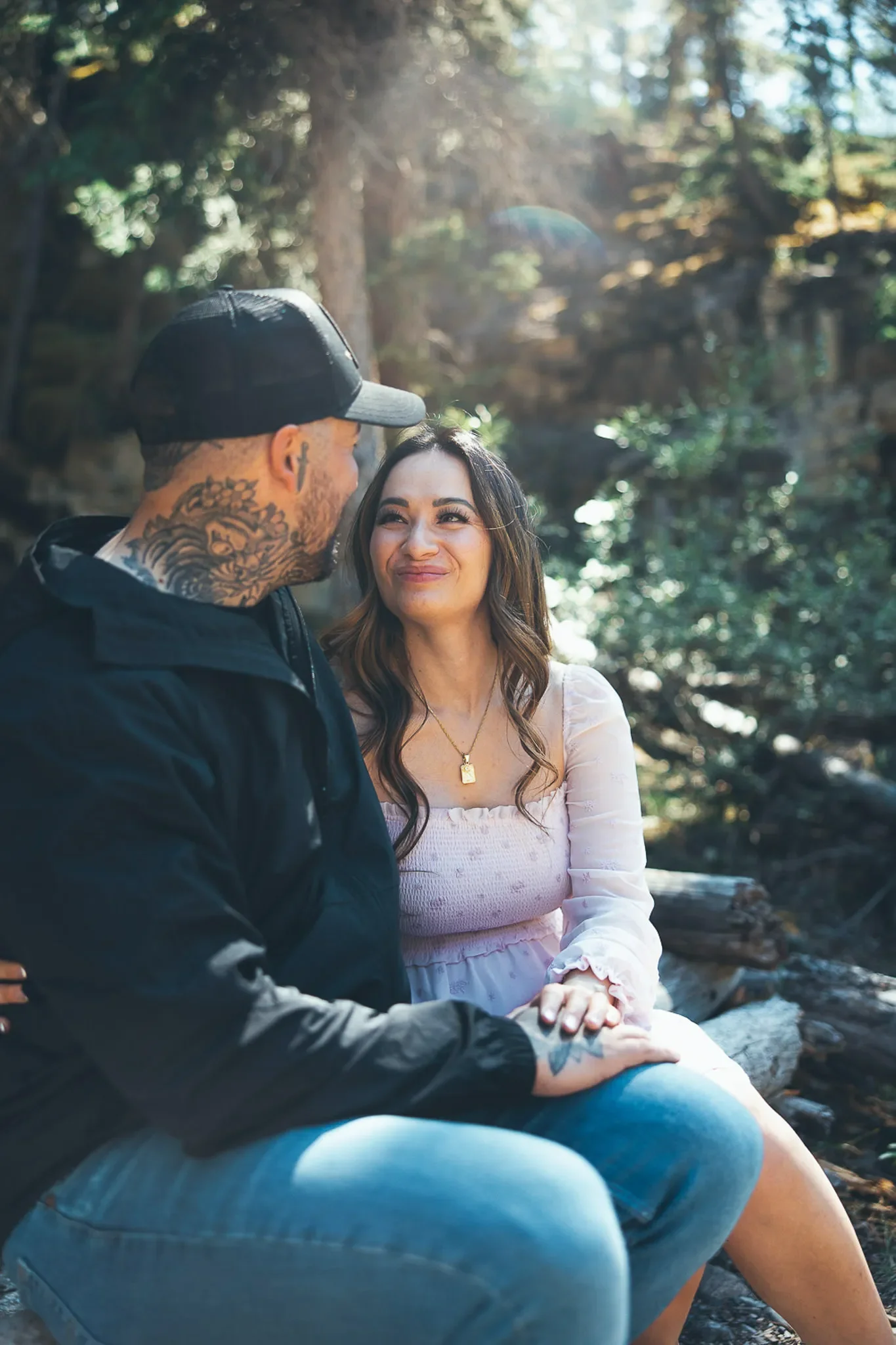 126_Couple-Sitting-Mountain-Forest-Trail.webp
