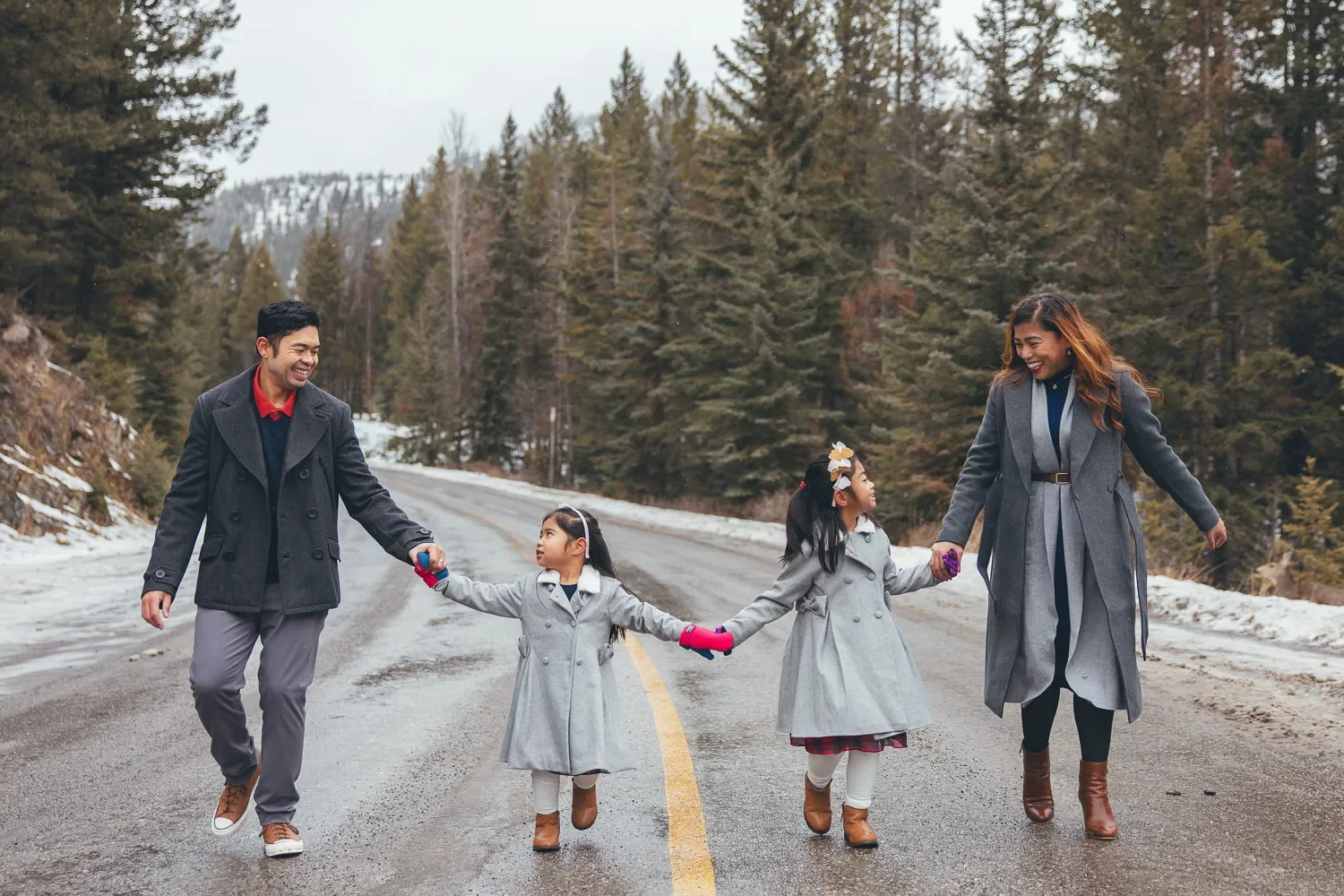 107_Family-Walking-Mountain-Forest-Road-Canadian-Rockies.webp