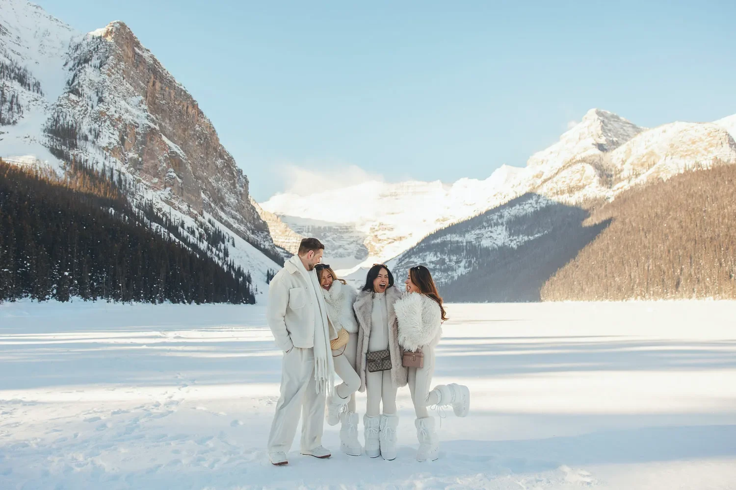 117_Friends-Laughing-Winter-Fashion-Lake-Louise-Banff.webp