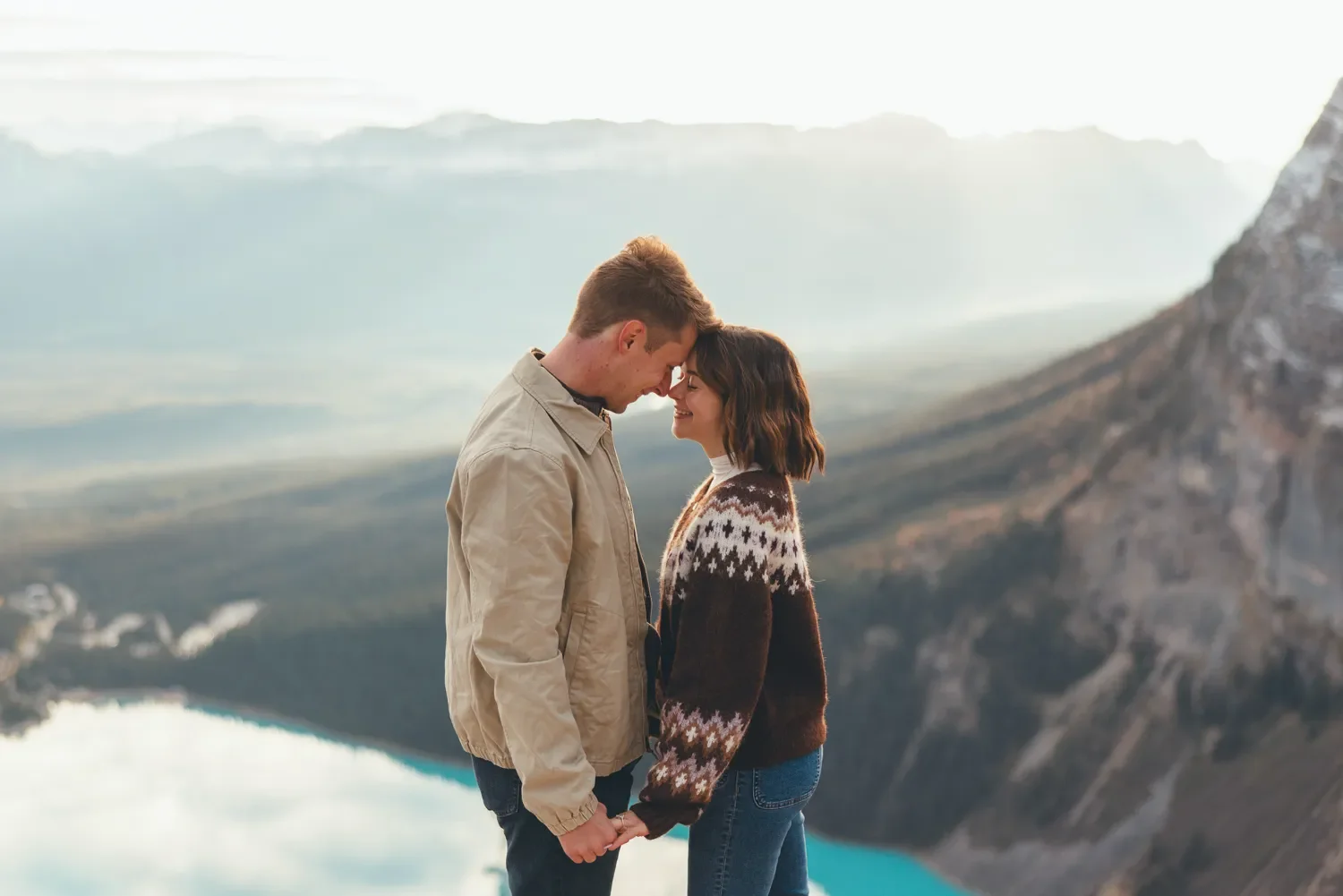 112_Couple-Hiking-Canadian-Rockies-Mountain-Viewpoint.webp