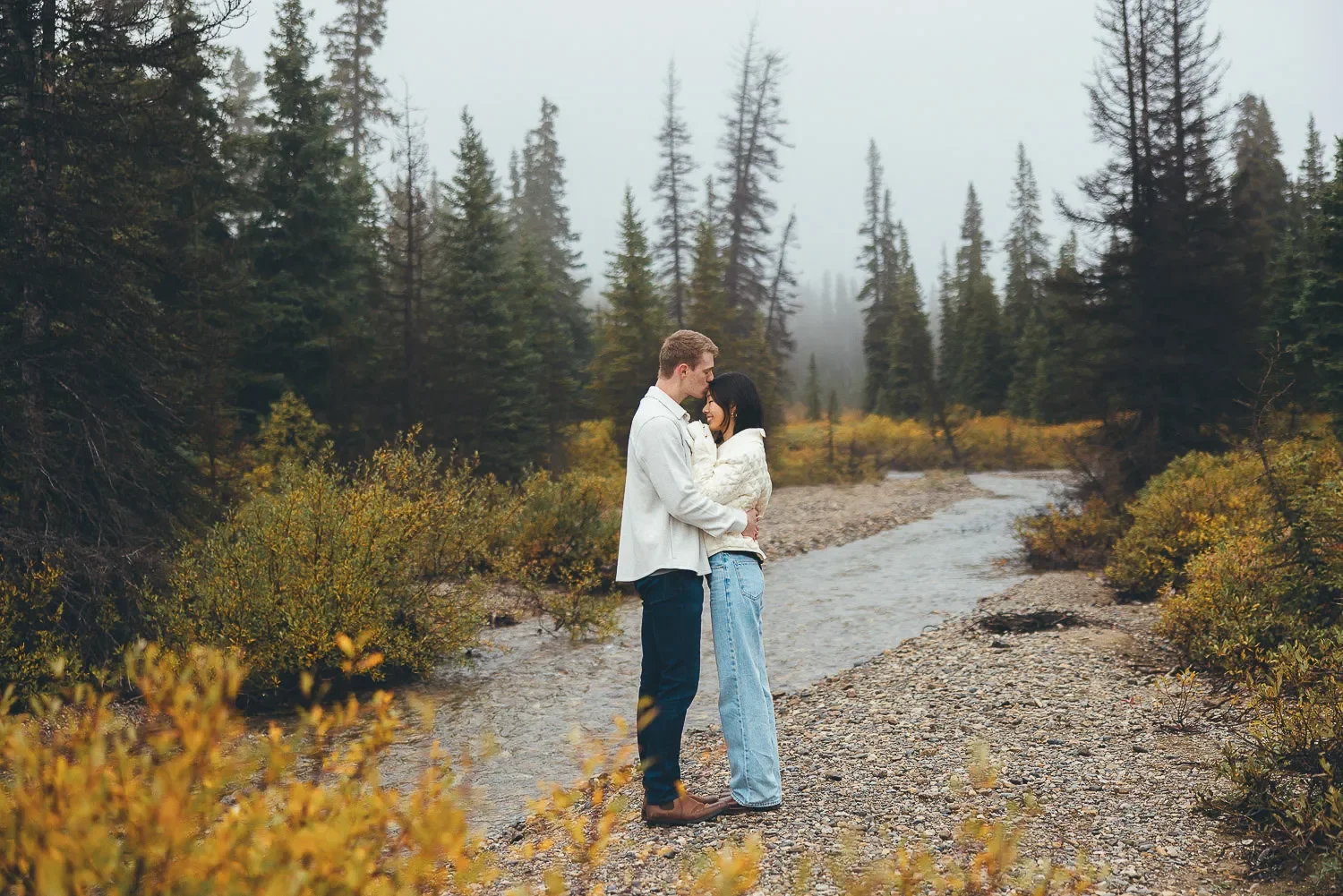 116_Couple-Engagement-Portrait-Rocky-Mountain-River-Trail.webp