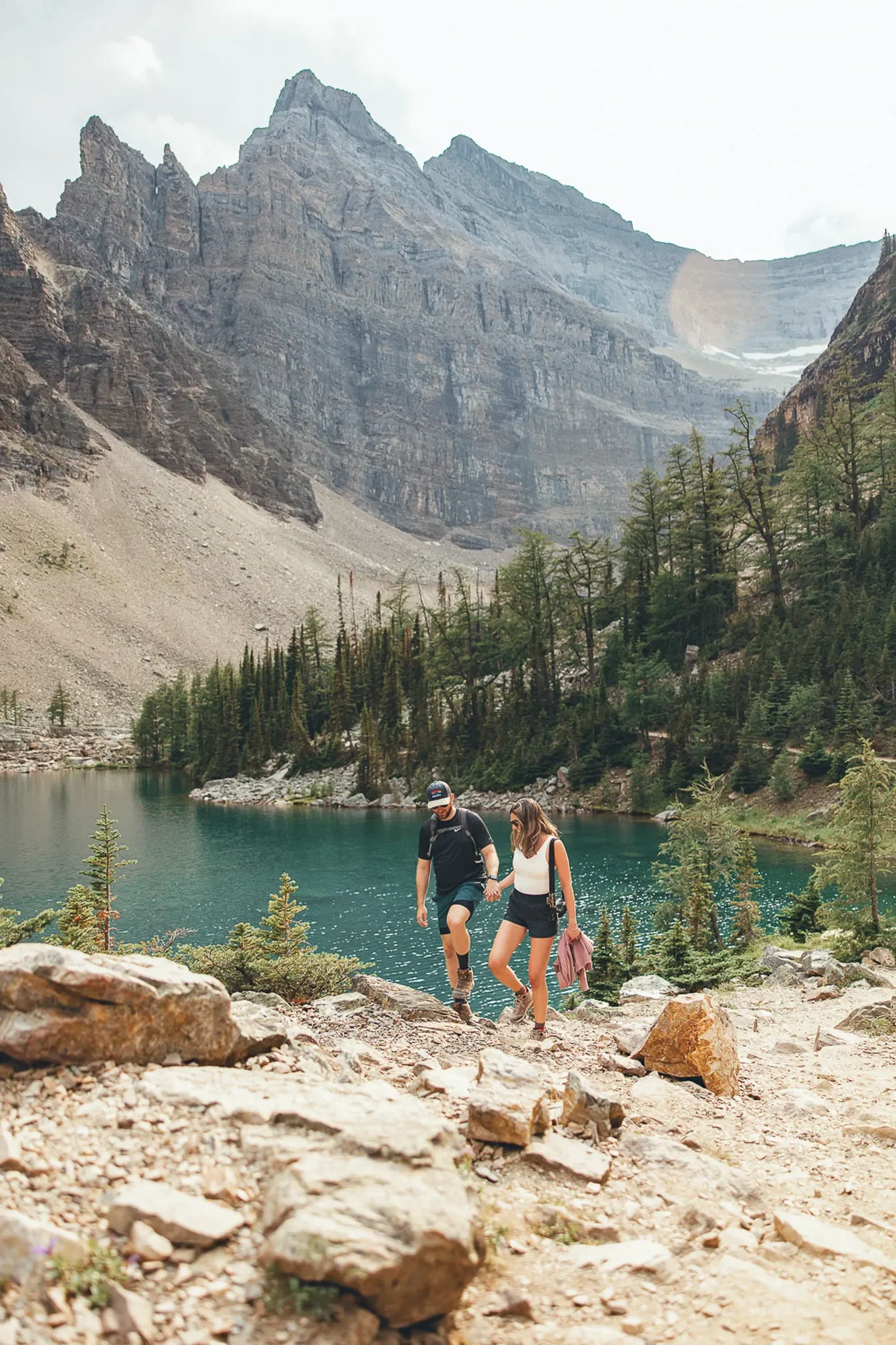 141_Couple-Hiking-Alpine-Lake-Canadian-Rockies.webp