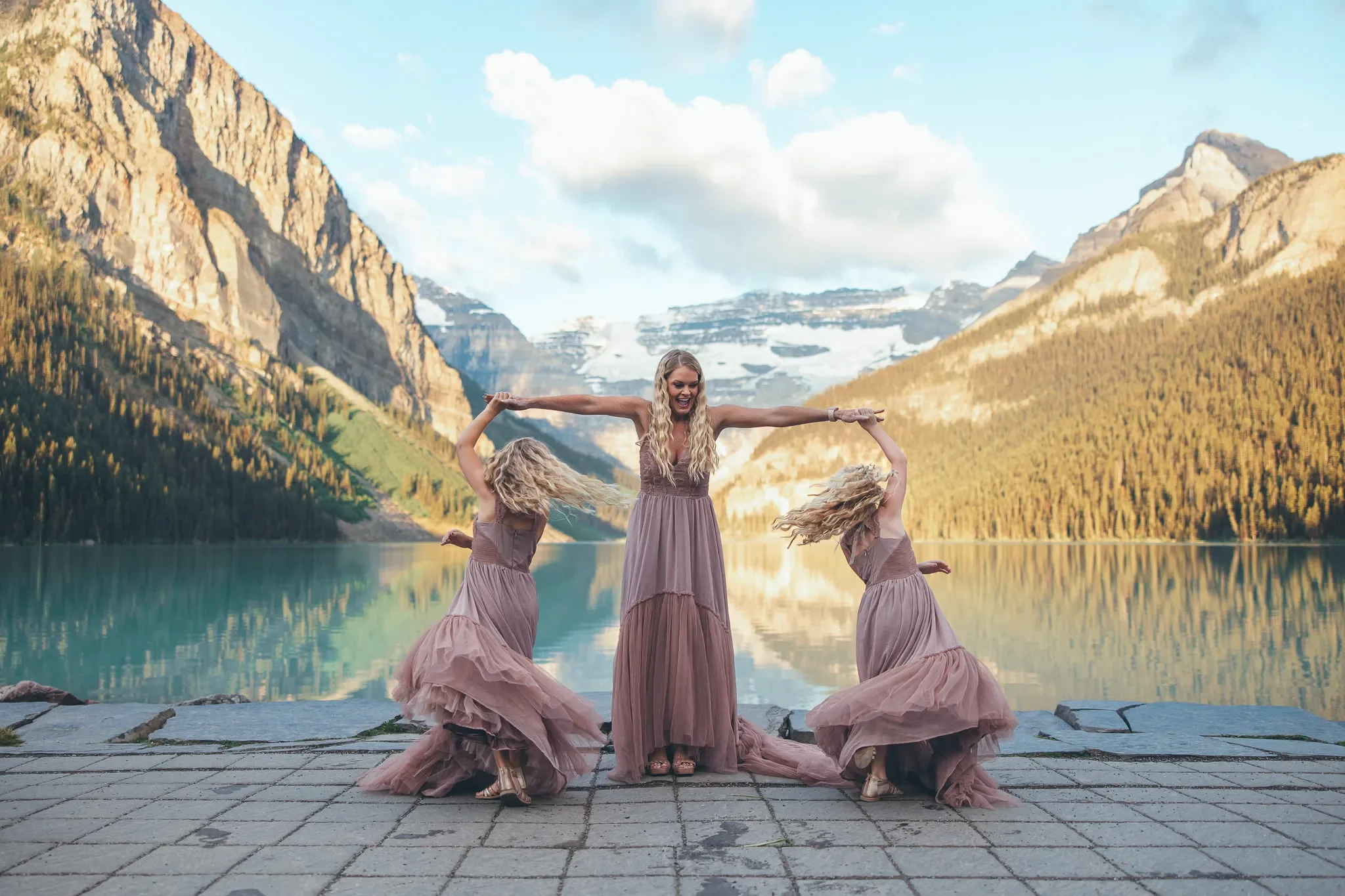 123_family-portrait-dancing-lake-louise-mountain-landscape.webp