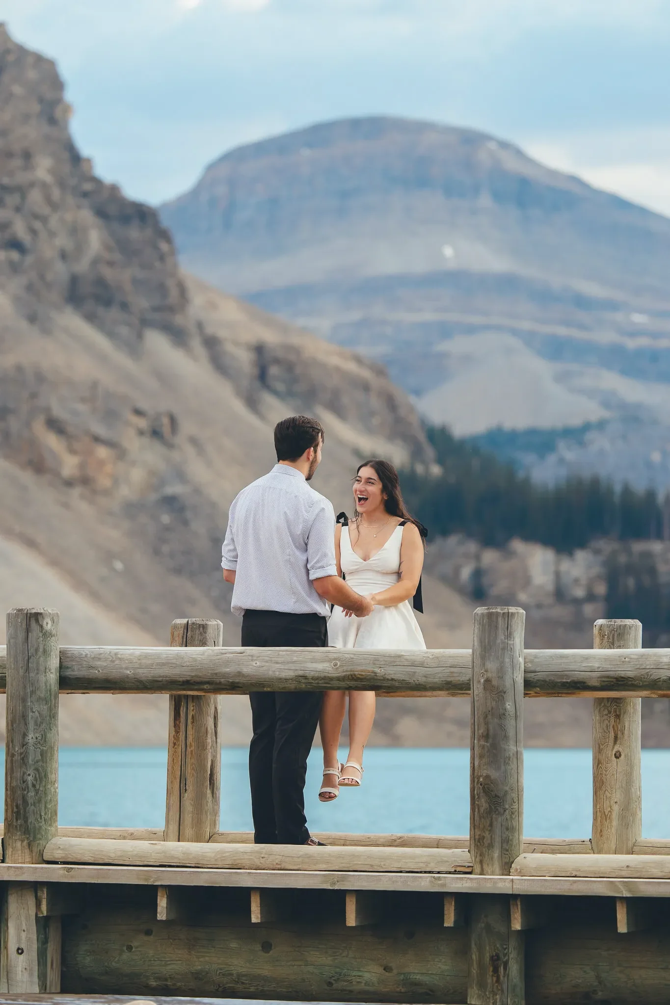 124_couple-engagement-proposal-alpine-lake-mountain-viewpoint-canadian-rockies.webp