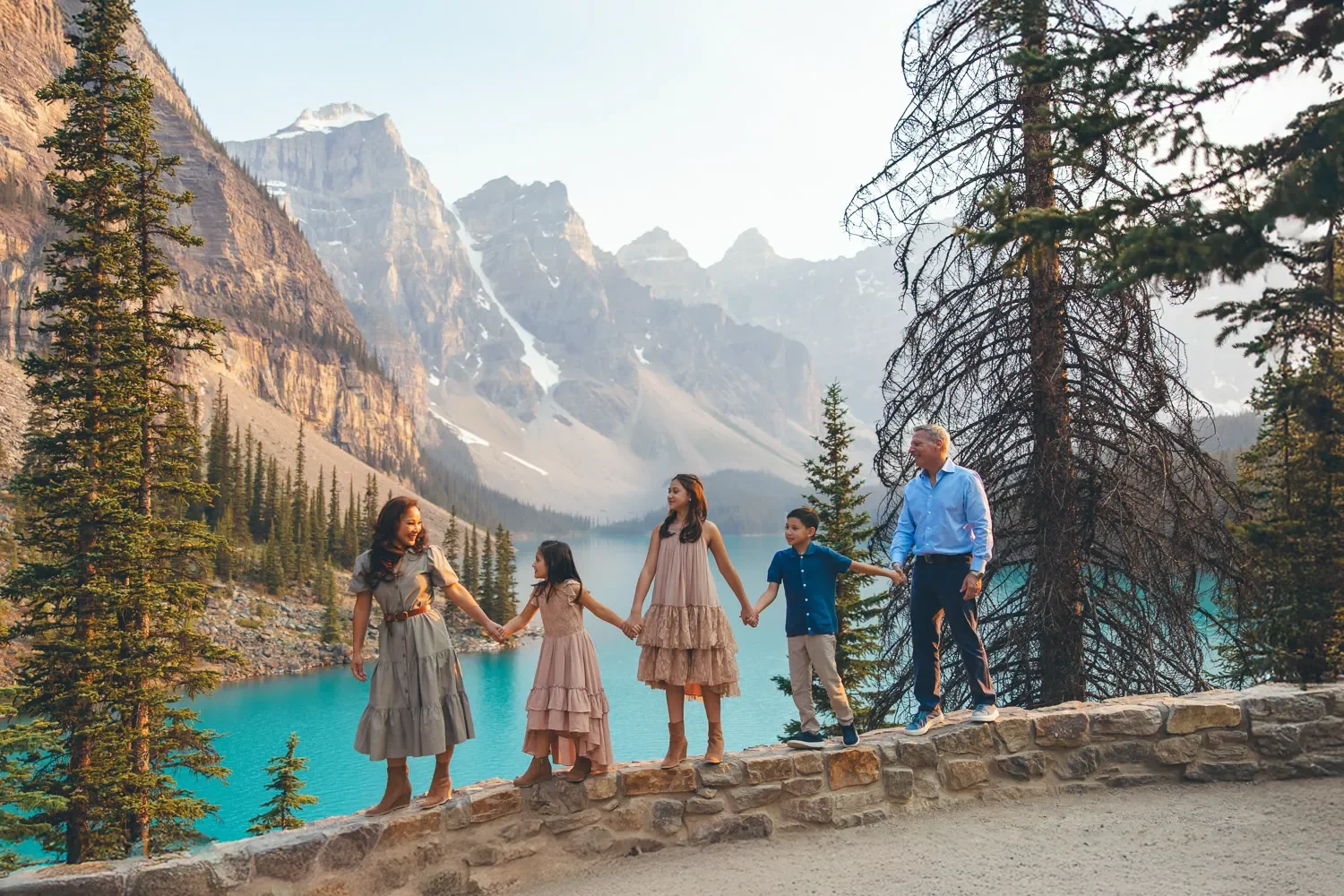 109_family-portrait-walking-moraine-lake-banff-canadian-rockies.webp
