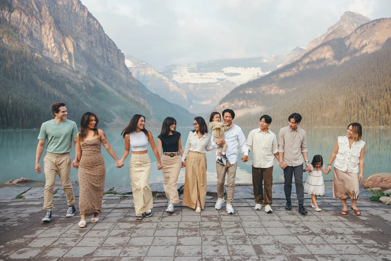123_Family-Portrait-Walking-Lake-Louise-Banff.webp