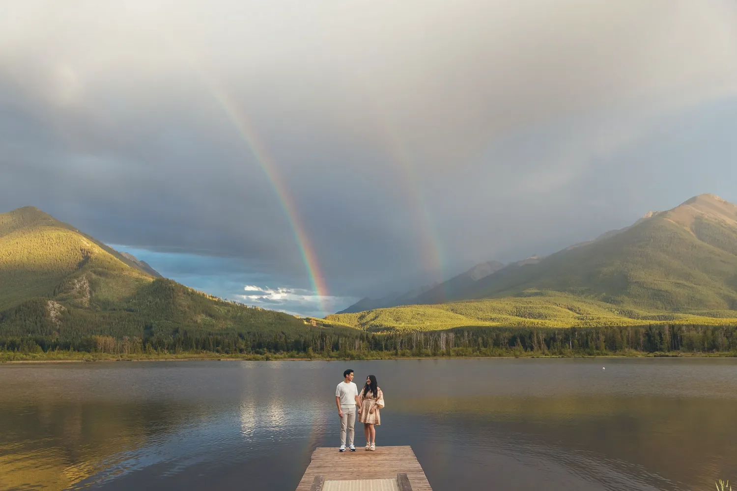 123_Couple-Standing-On-Dock-Double-Rainbow-Banff.webp