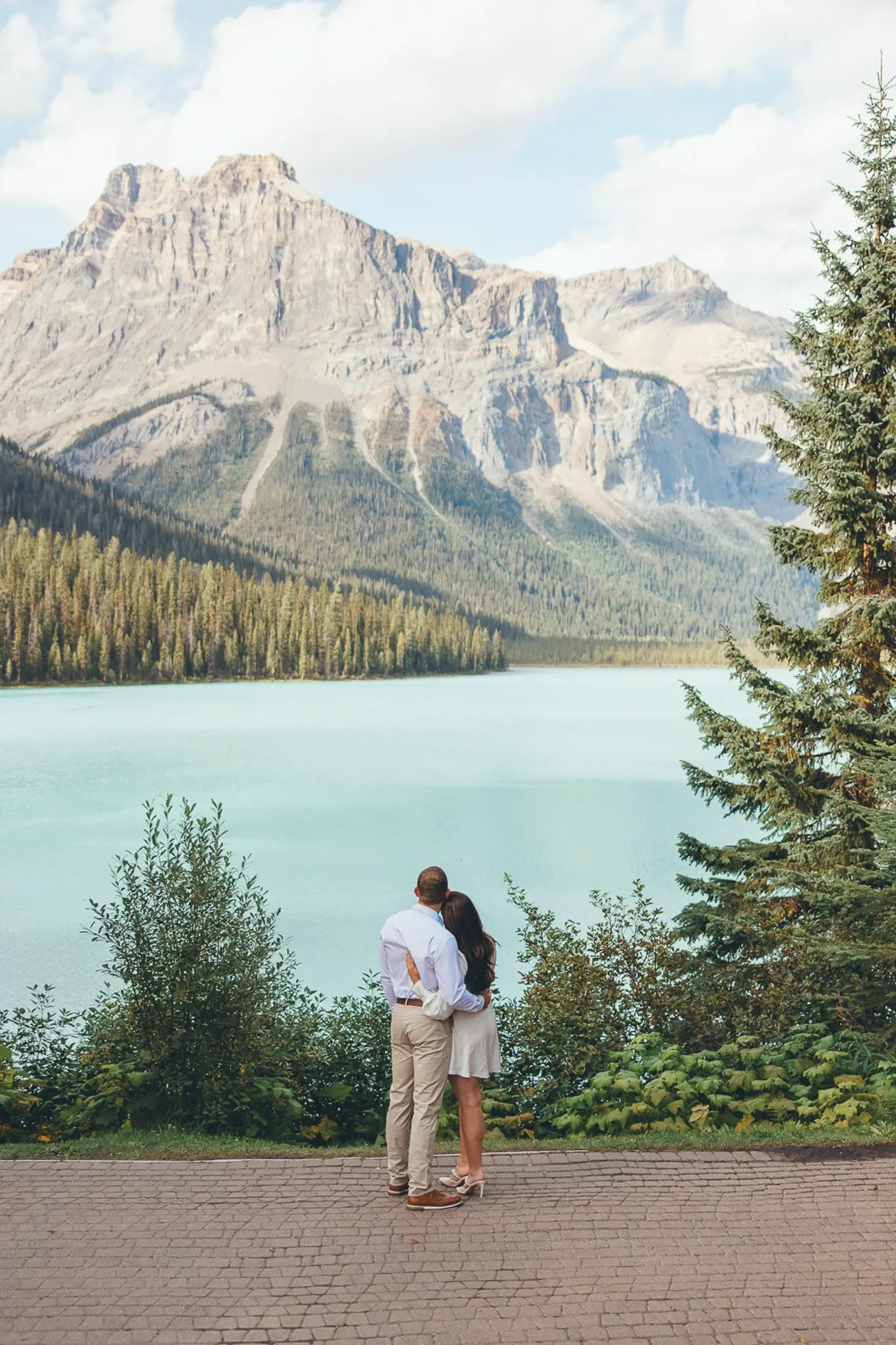 114_Couple-Viewing-Canadian-Rockies-Alpine-Lake.webp