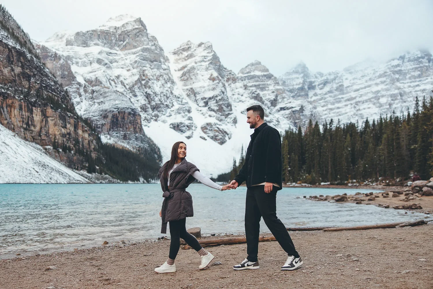 115_couple-walking-moraine-lake-banff.webp