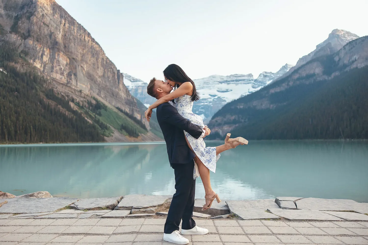 126_Couple-Kissing-Engagement-Lake-Louise-Canadian-Rockies.webp