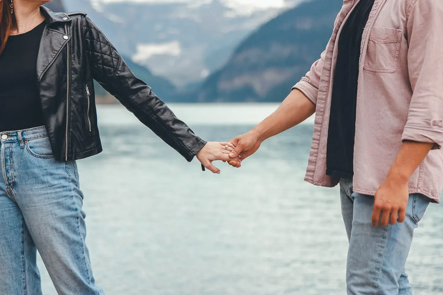 102_Couple-Engagement-Holding-Hands-Mountain-Lake.webp