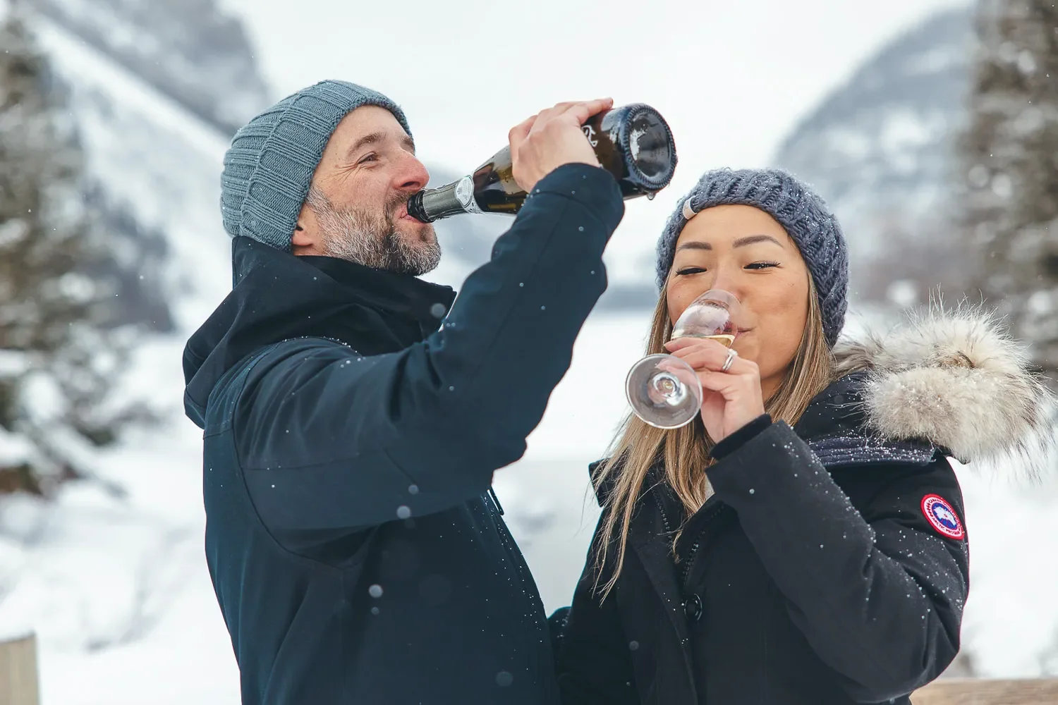 116_Couple-Drinking-Champagne-Winter-Canadian-Rockies-Toast.webp