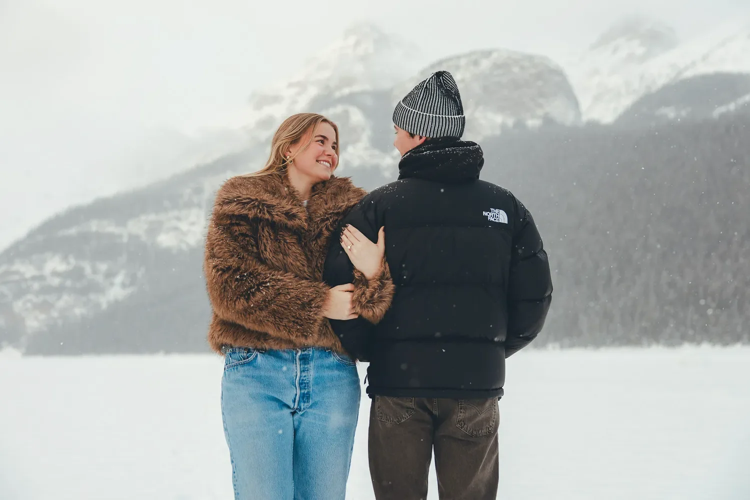 105_Couple-Engagement-Lake-Louise-Winter-Mountains.webp