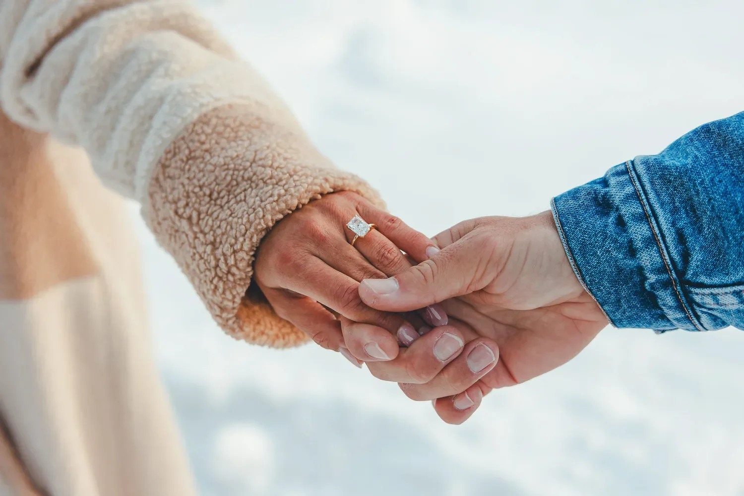 119_Engagement-Couple-Holding-Hands-Diamond-Ring-Canadian-Rockies.webp