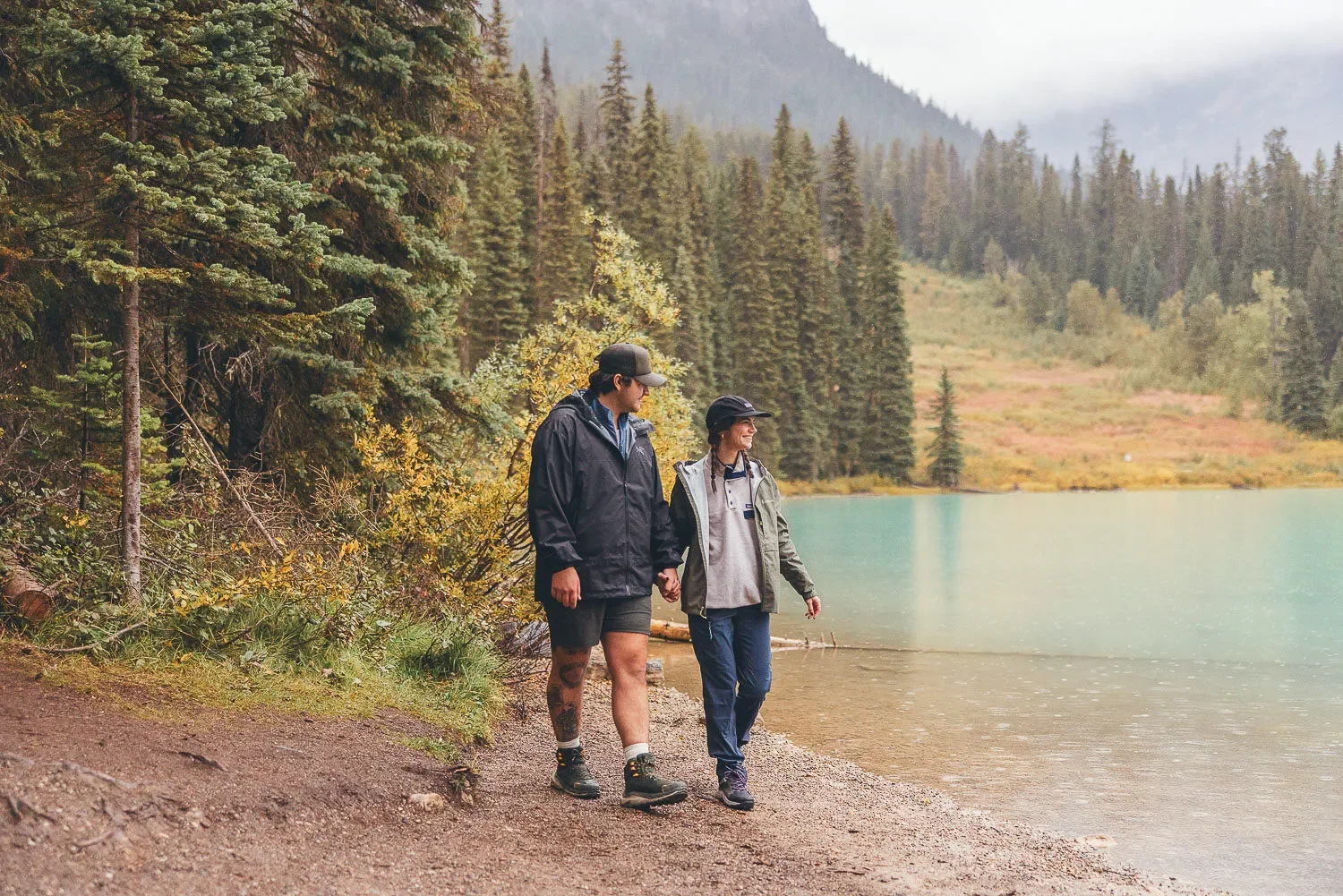108_couple-walking-emerald-lake-canadian-rockies.webp