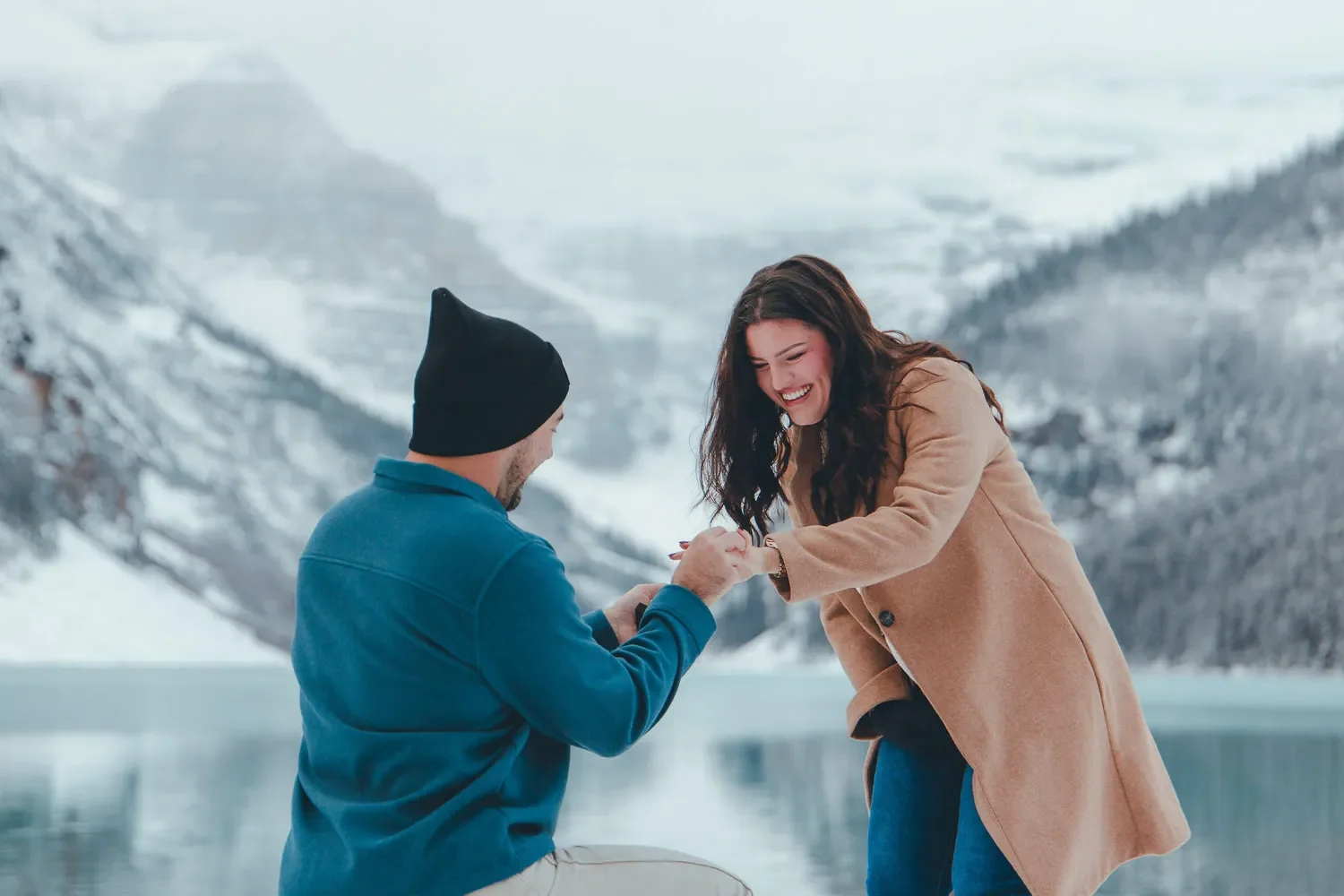 102_Couple-Proposal-Lake-Louise-Banff-Winter-Mountains.webp
