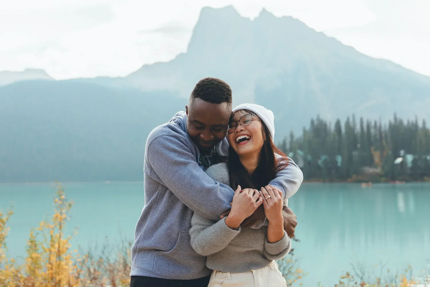 117_Couple-Laughing-Engagement-Emerald-Lake-Canadian-Rockies.webp