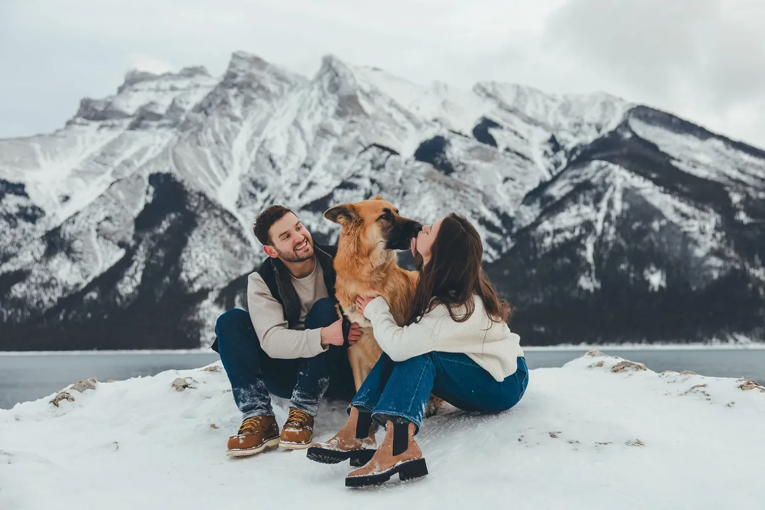 119_couple-with-german-shepherd-canadian-rockies-mountain-lake.webp