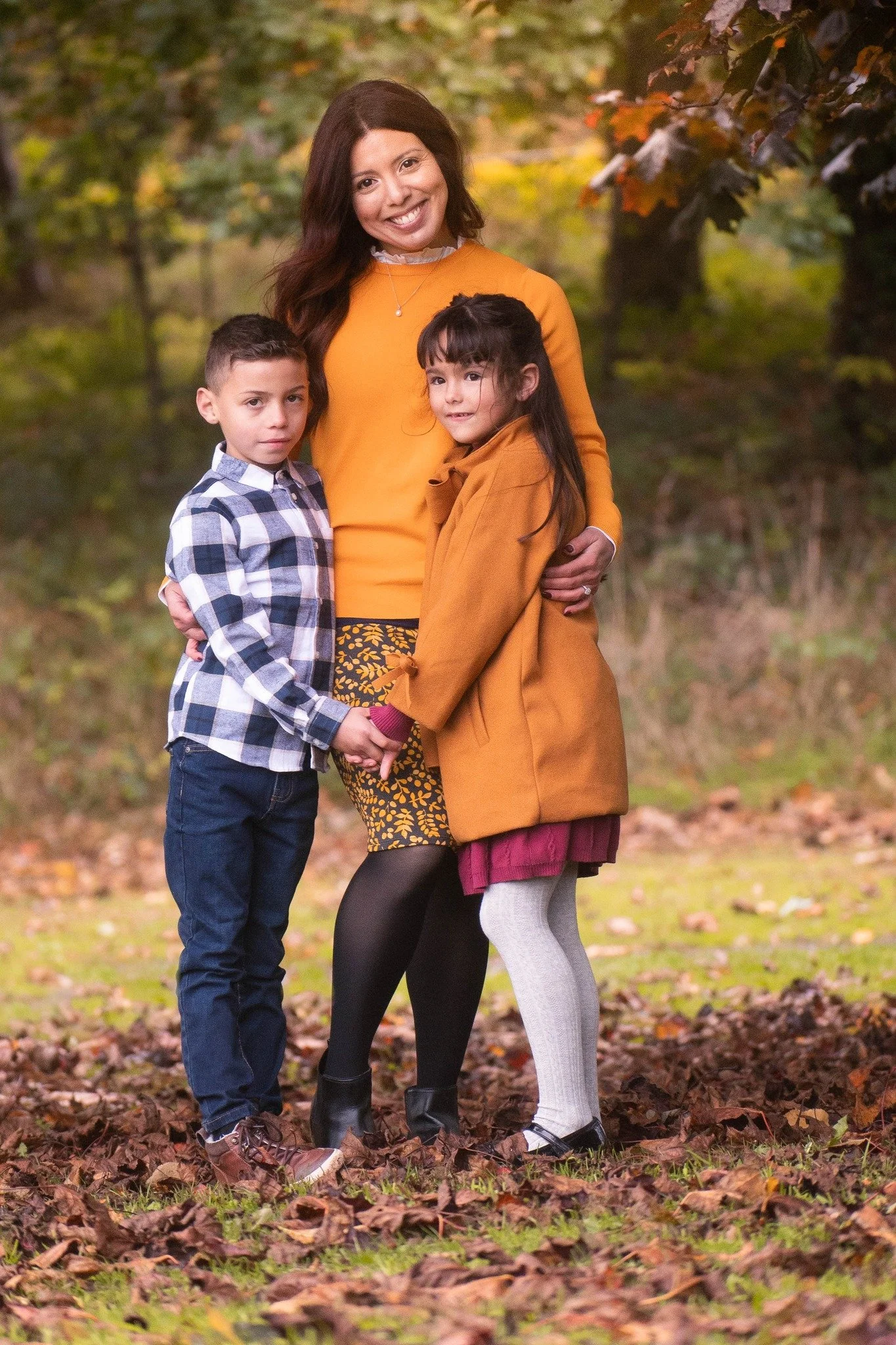 Mum, brother and sister smiling in family portrait photo in Ballynahinch