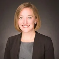 Beth Corbett with dark gray background