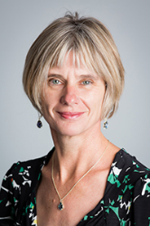 Dr. Sandra van den Berg with gray background