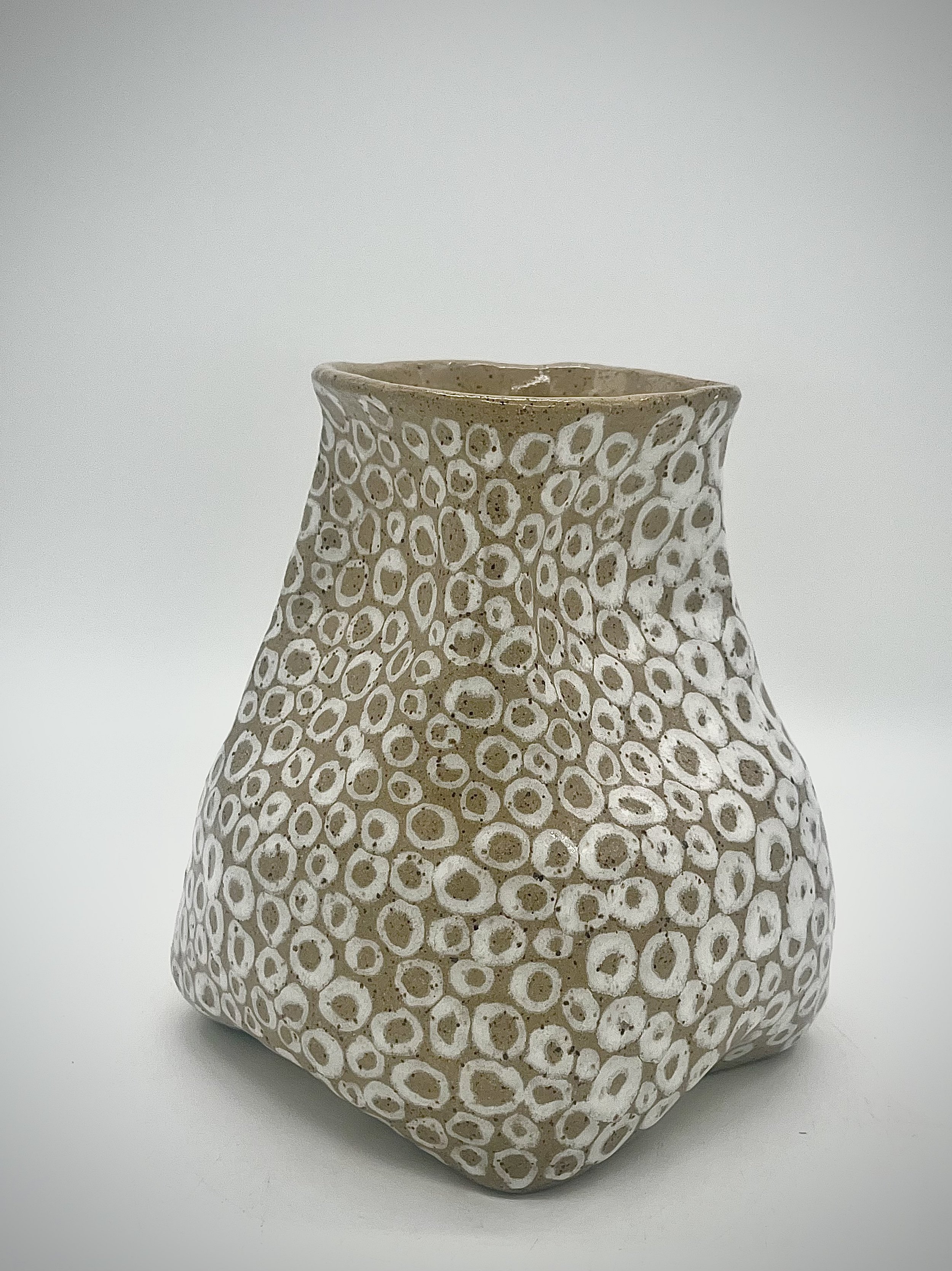 coiled vase with circles