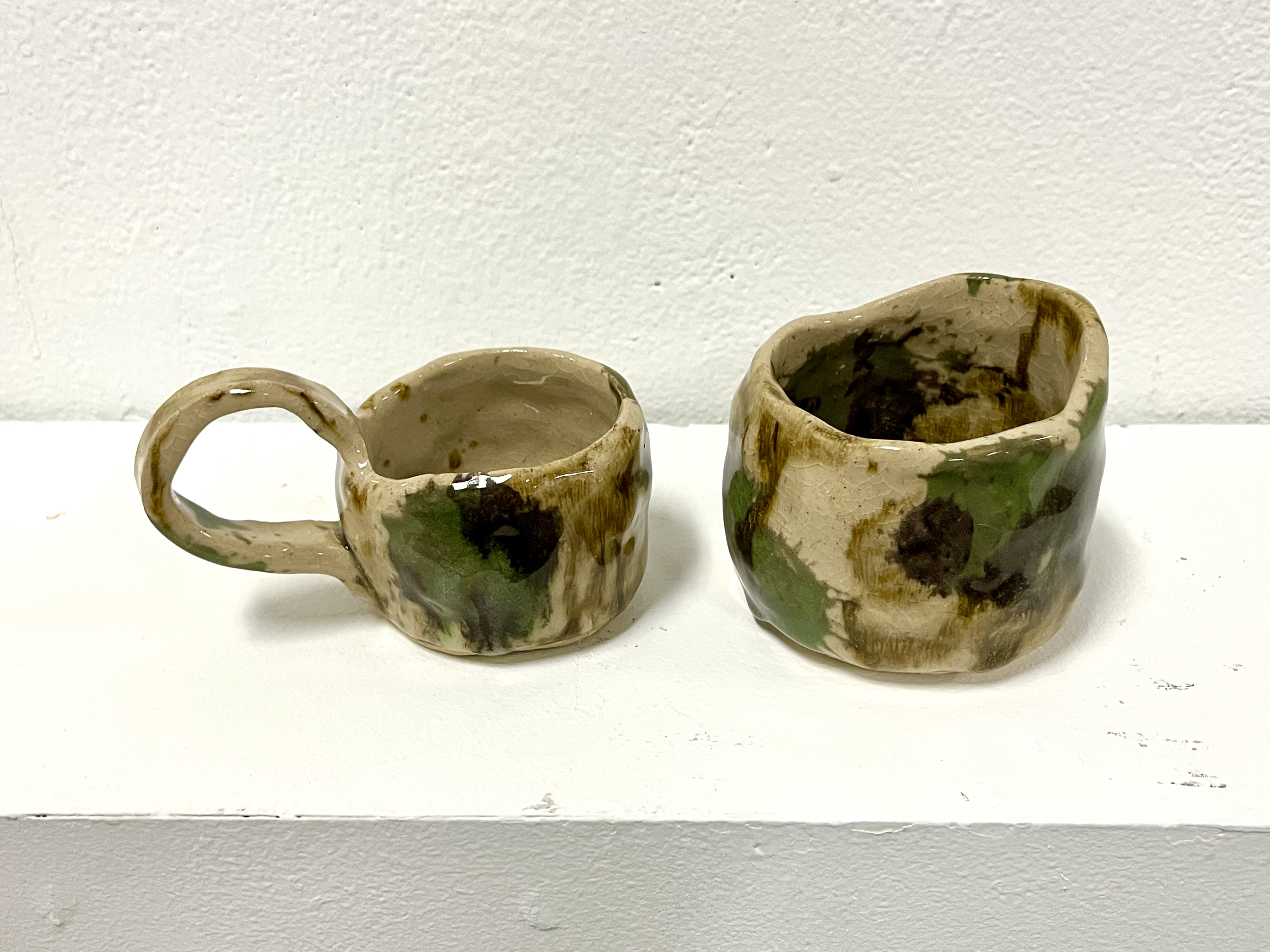 splatter cups. hand built stoneware, 2023.