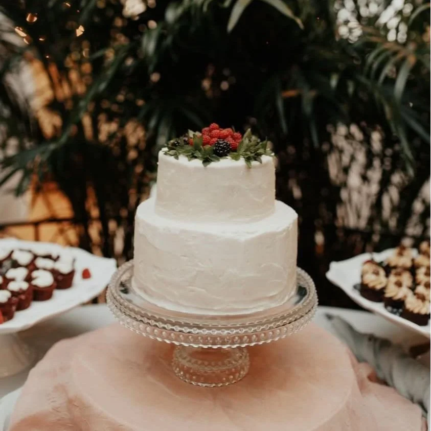 white cake on stand.jpg